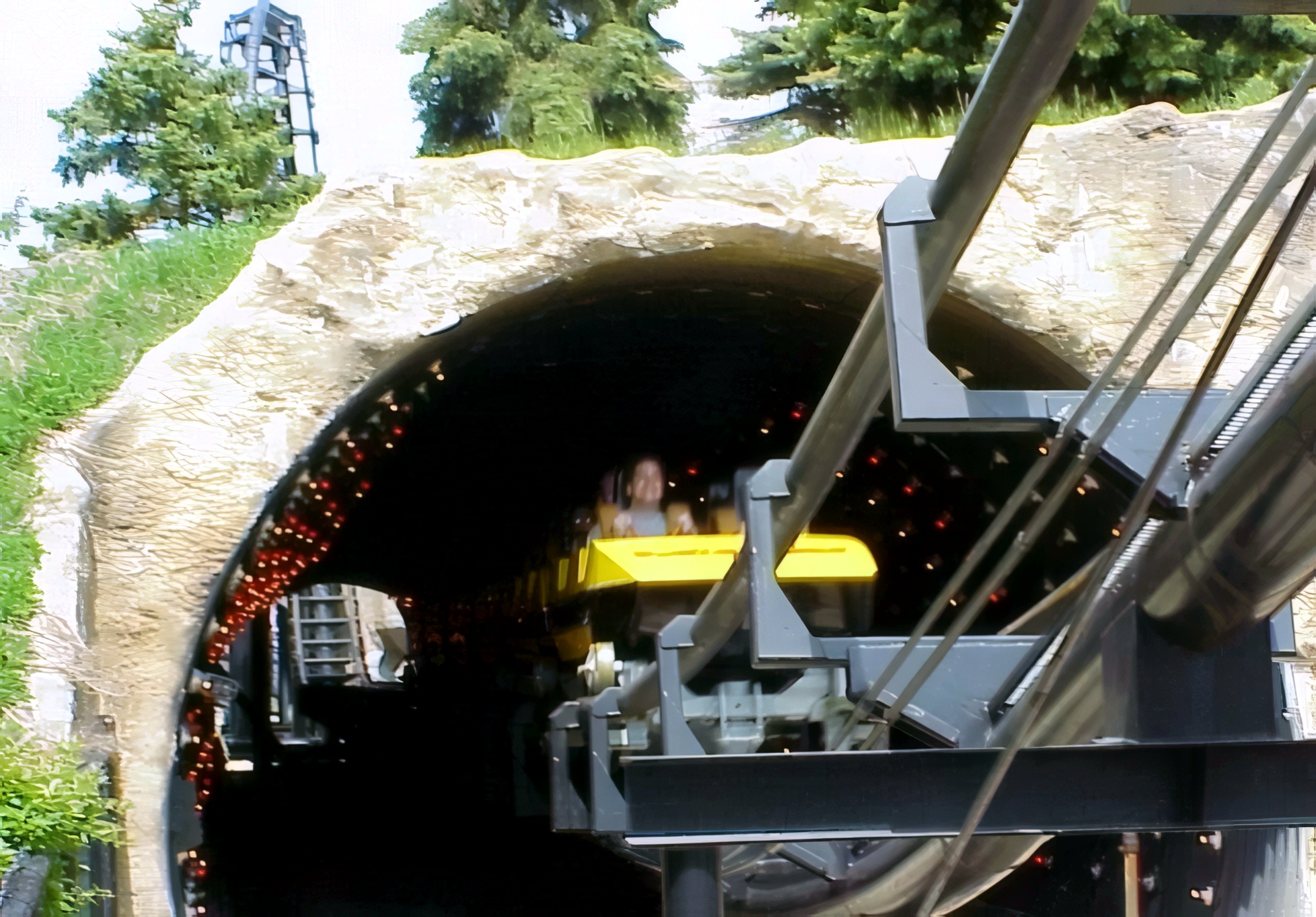 A Demon train entering the rock tunnel at Six Flags Great America, 2000