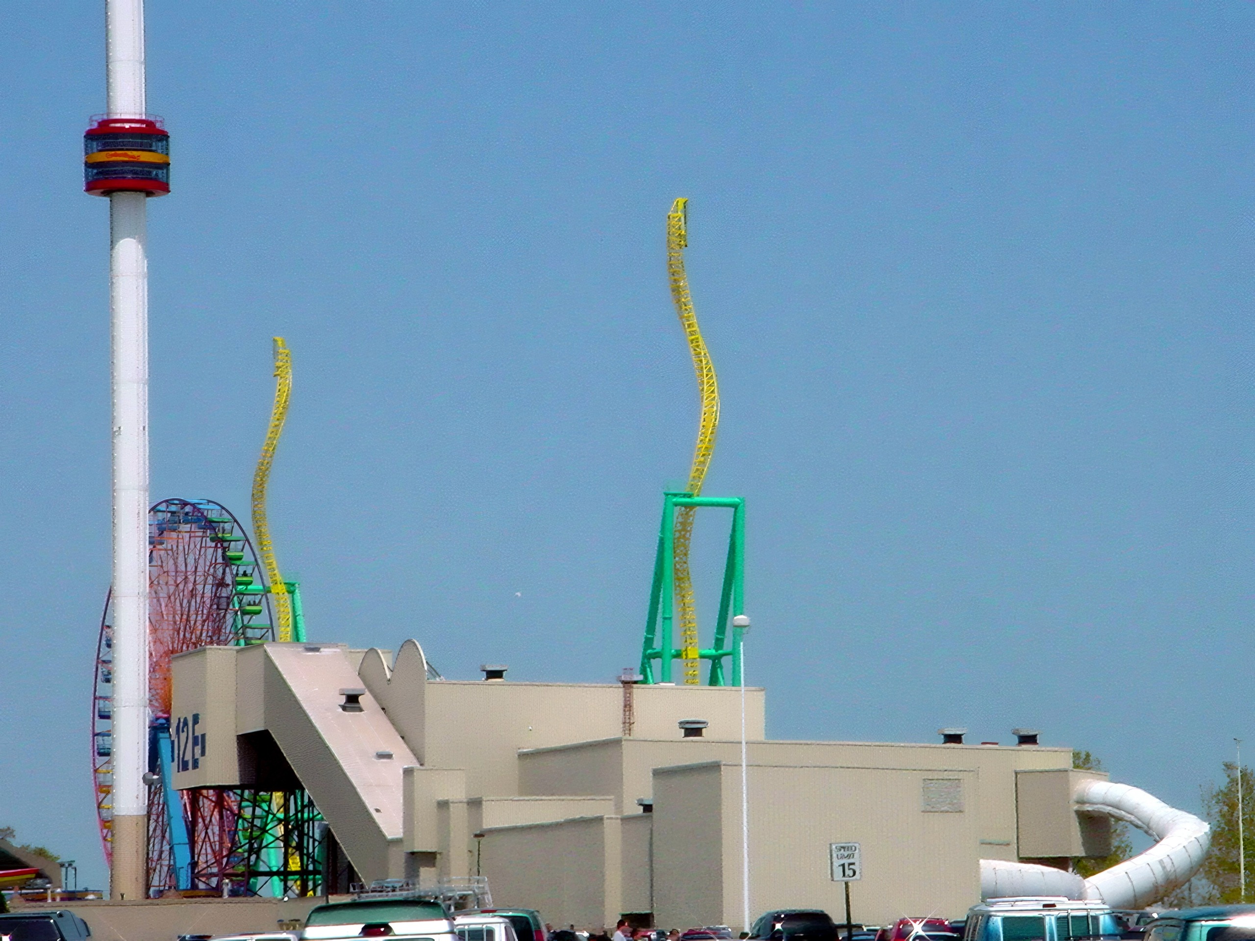 Show building with Wicked Twister tower and Sky Ride pole, May 5, 2002.