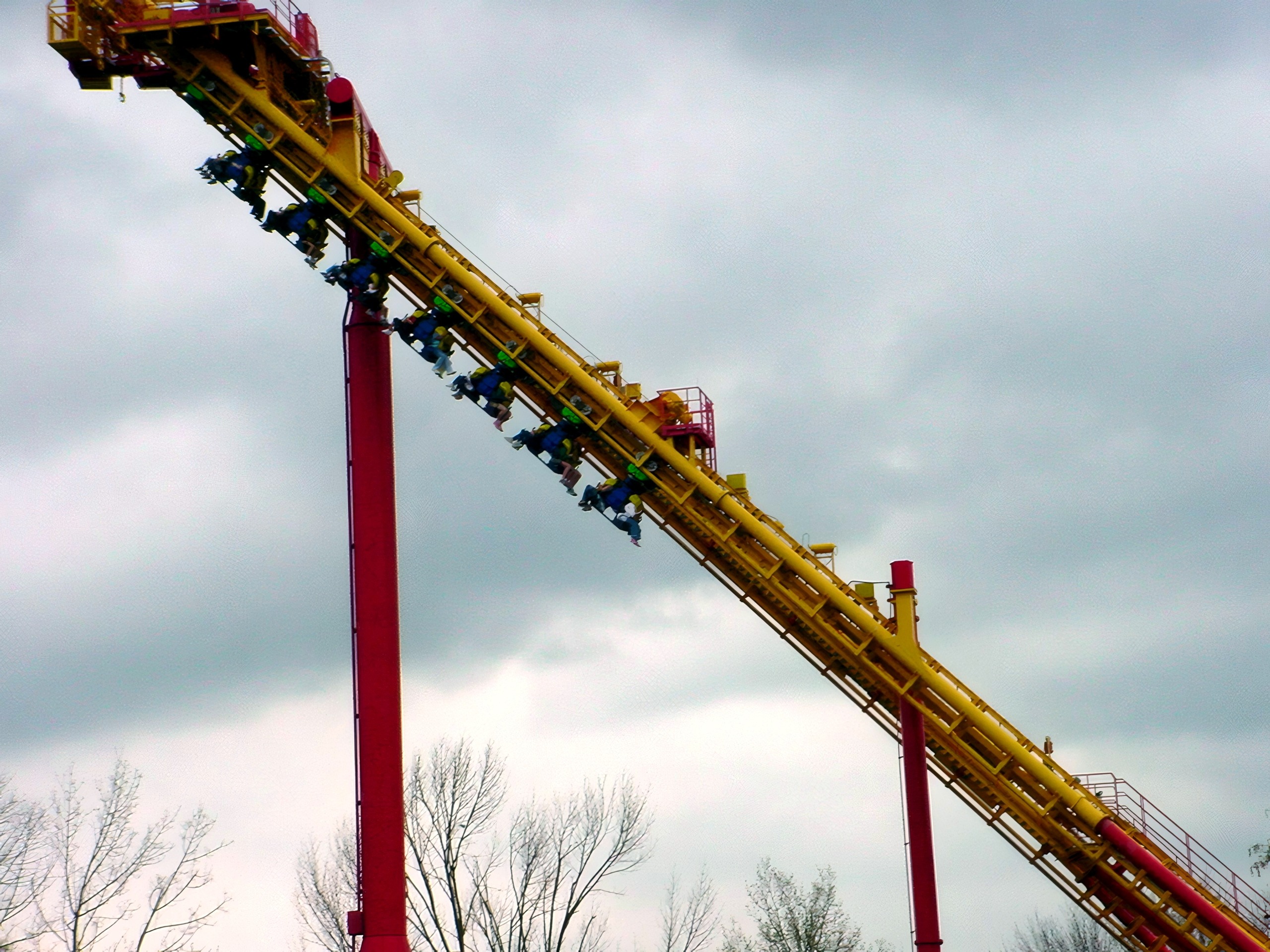 A Face/Off train on the steep descent at Kings Island, April 2002