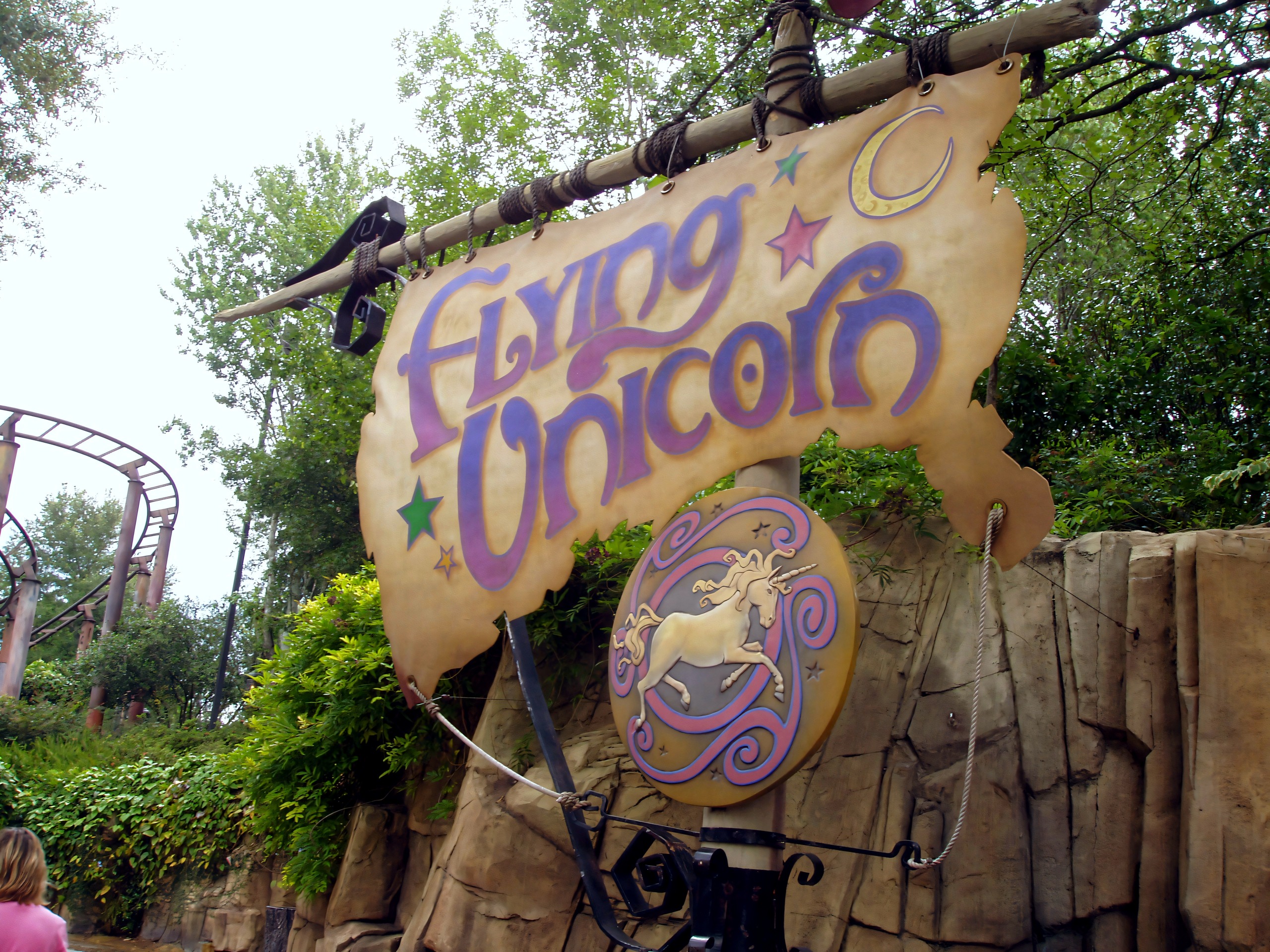 Flying Unicorn ride sign with the track behind, Flying Unicorn, July 2006