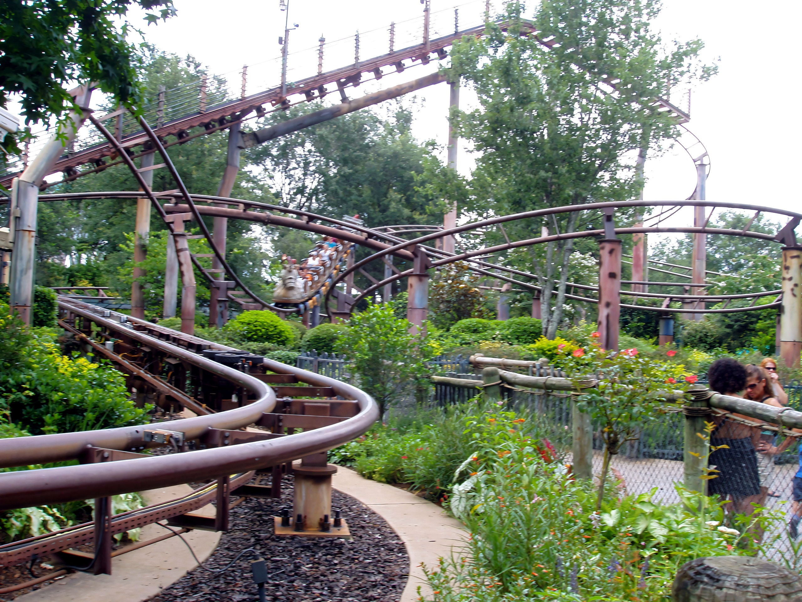 The junior coaster's track winding through the gardens, Flying Unicorn, July 2006