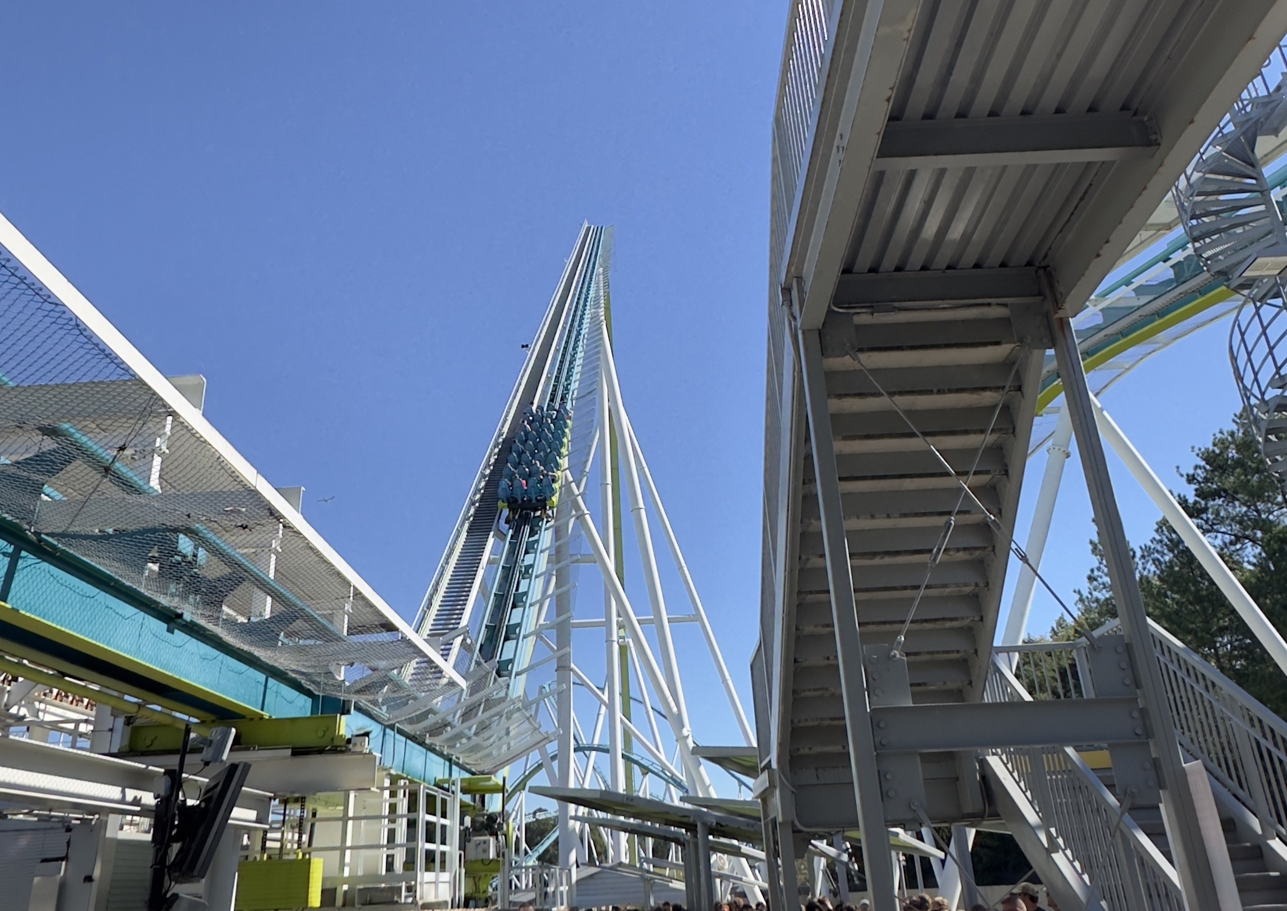 Fury 325's lift framed between the queue walkway and the exit stairs, Carowinds, October 2024