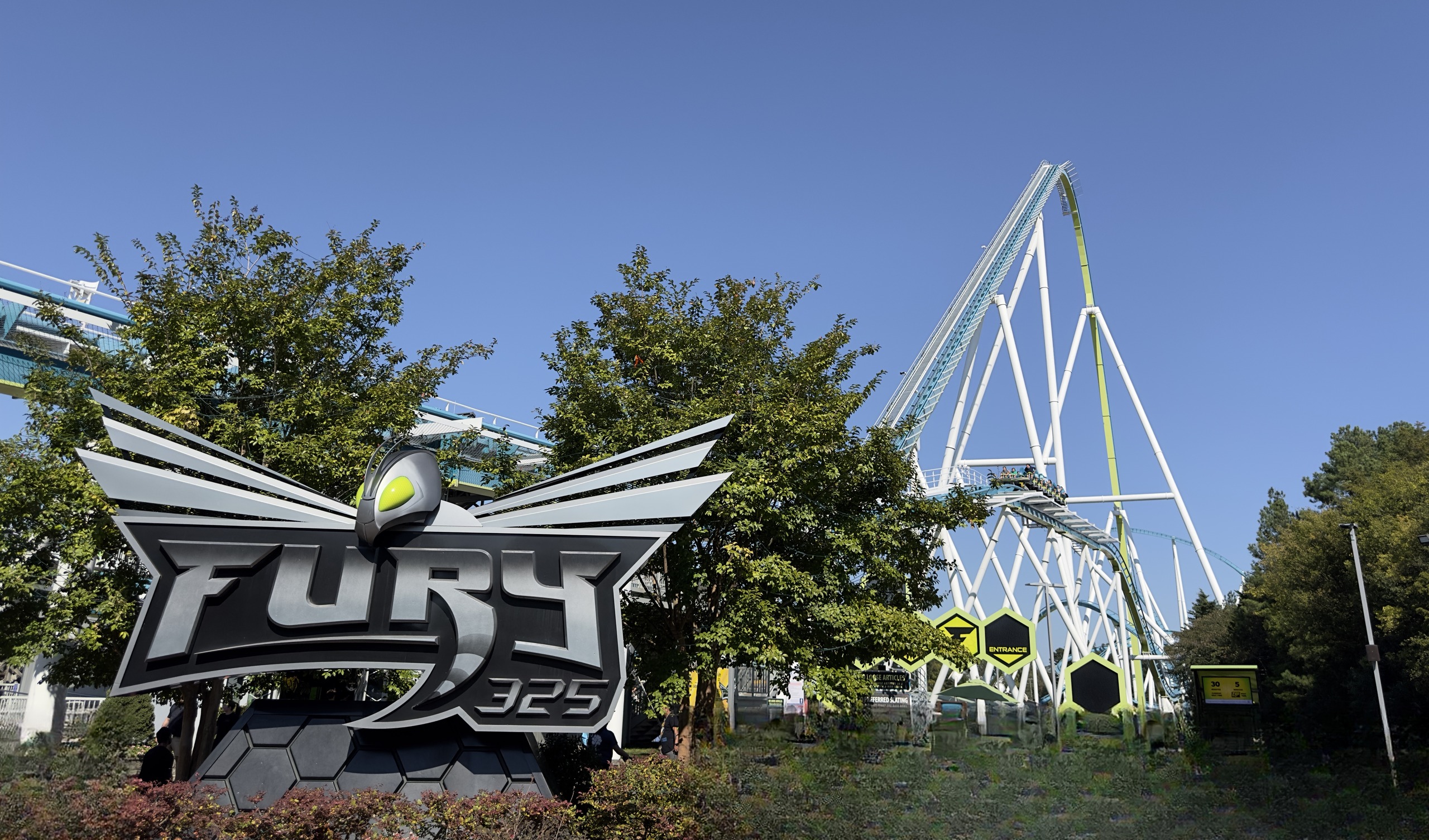 The Fury 325 sign and the ride's entrance with the lift hill behind, Carowinds, October 2024