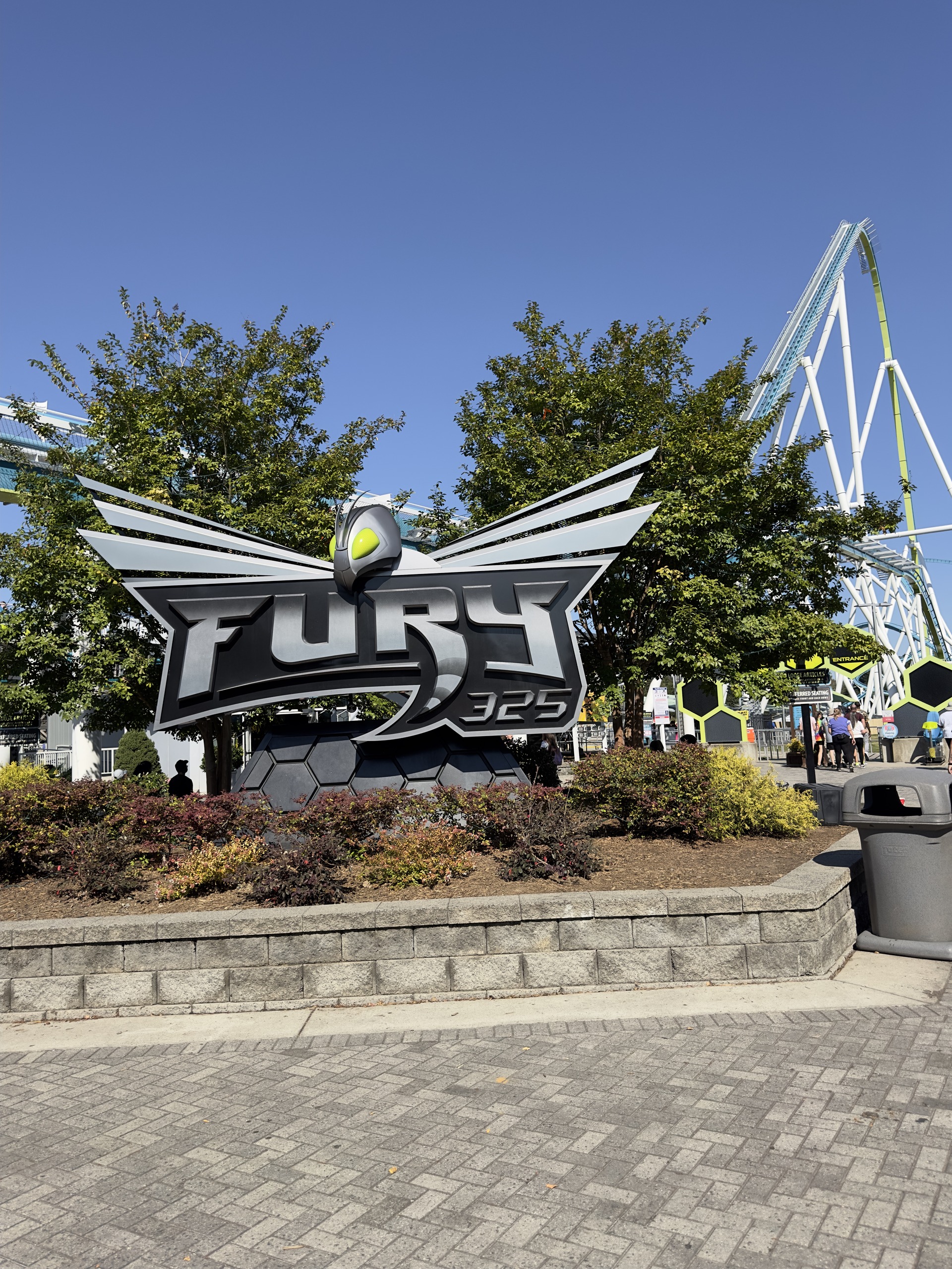 The Fury 325 sign with the white lift structure rising behind it, Carowinds, October 2024
