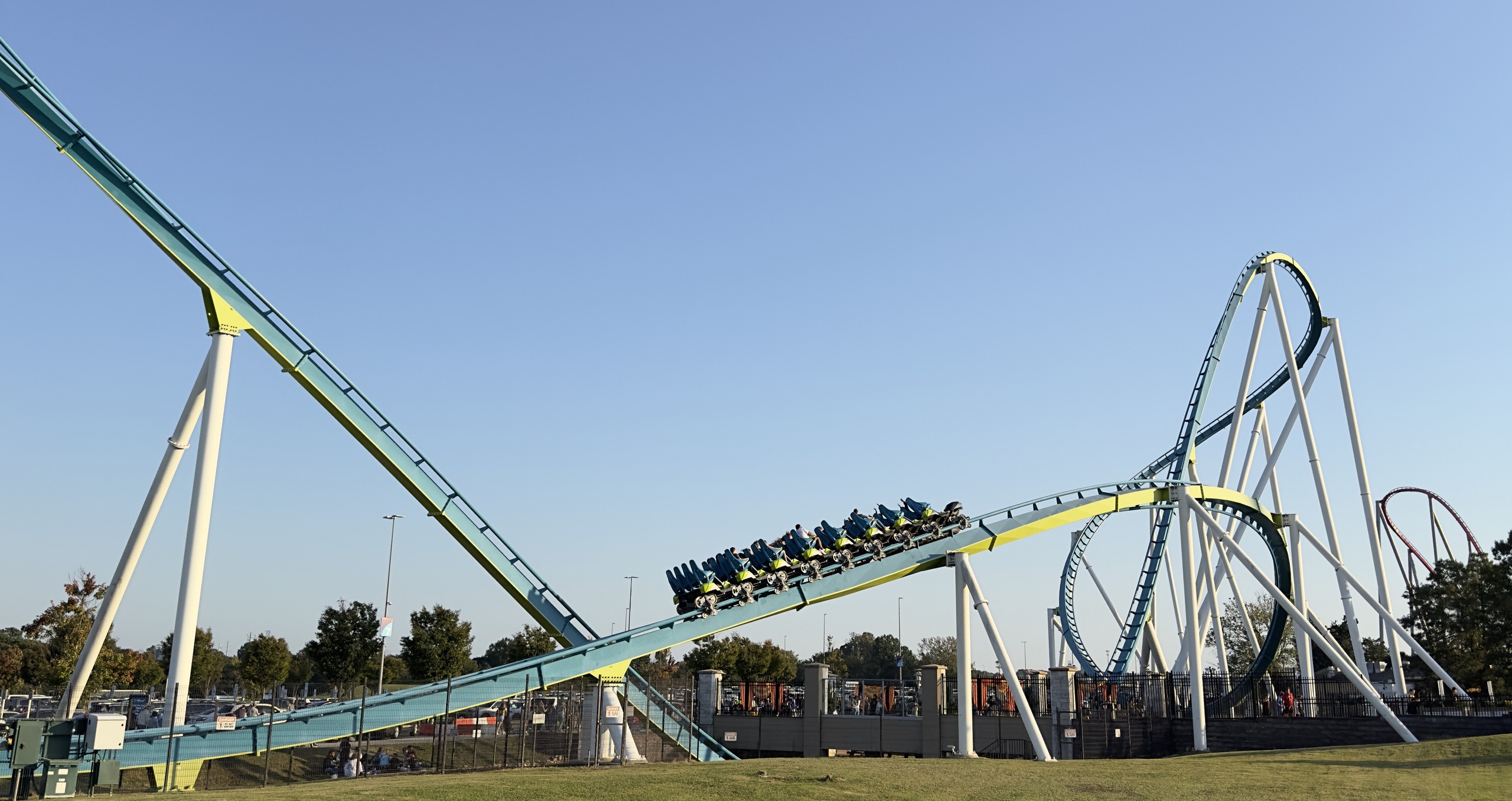 A Fury 325 train heading toward the turnaround with the drop behind, Carowinds, October 2024