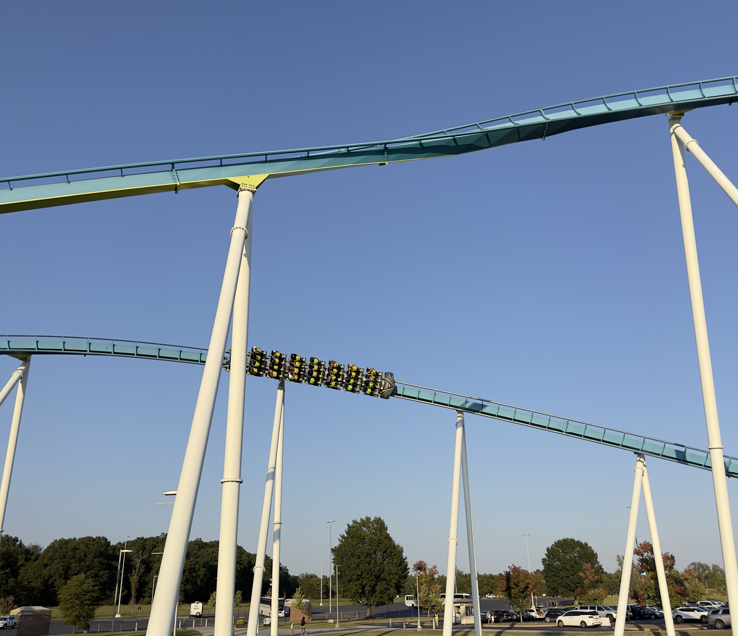 A Fury 325 train on a high airtime hill over the parking lot, Carowinds, October 2024