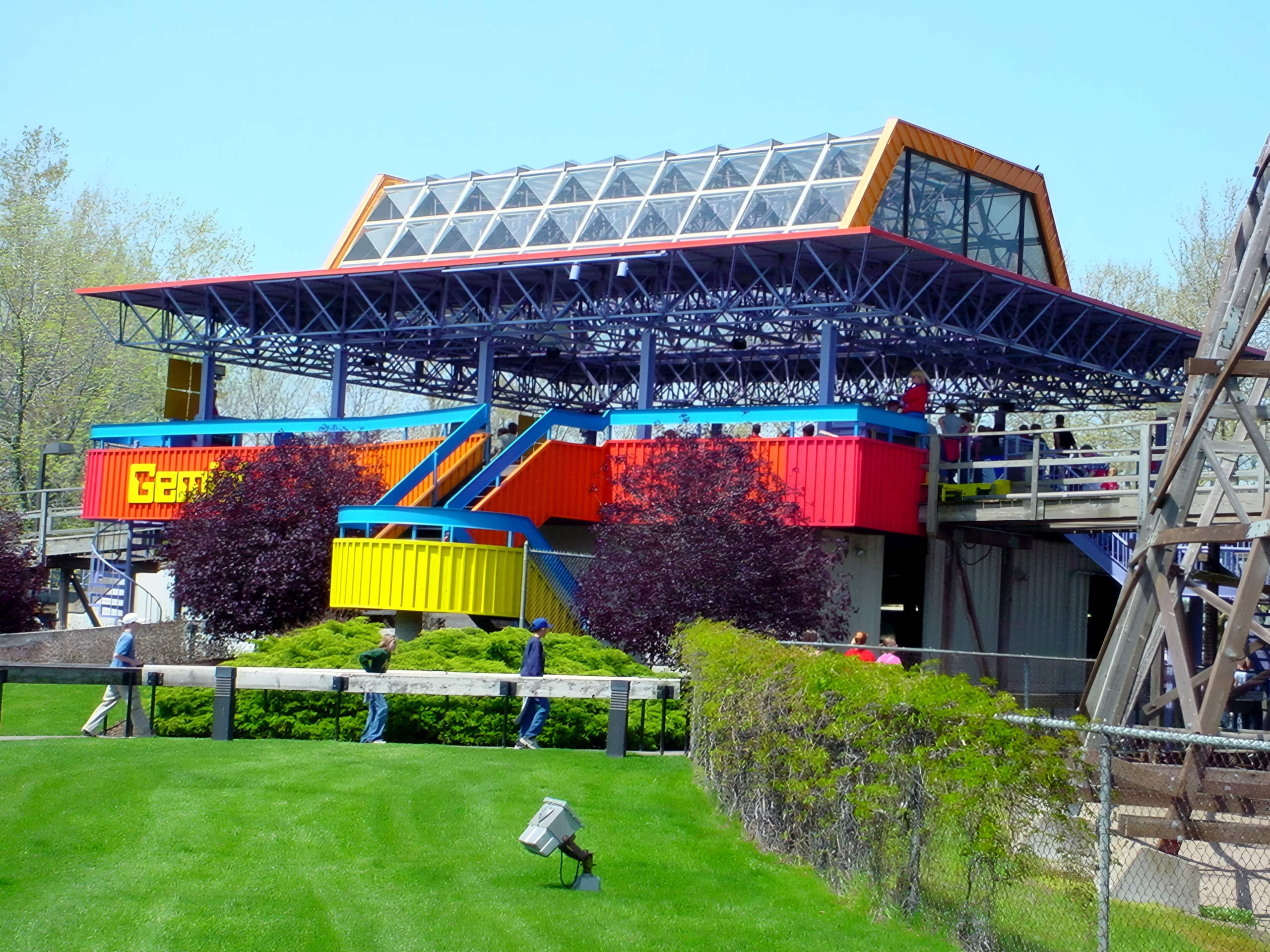 The Gemini station canopy and blue exit stairs seen from the lawn at Cedar Point, May 2002