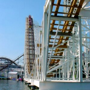 Hoosier Hurricane at Indiana Beach: a train on the lift hill above Lake Shafer