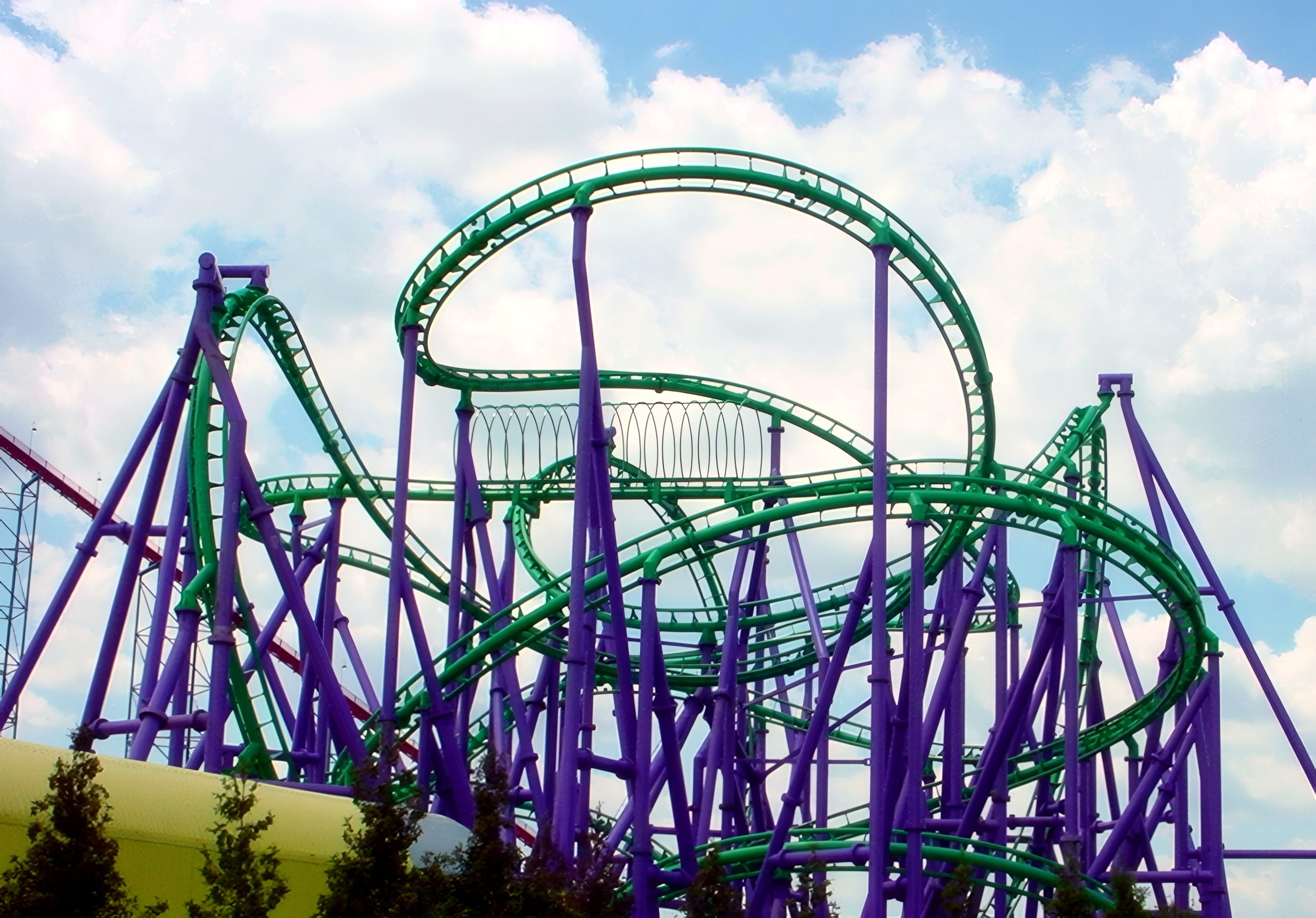 The Joker's Jinx track looping above the purple supports at Six Flags America, July 2001