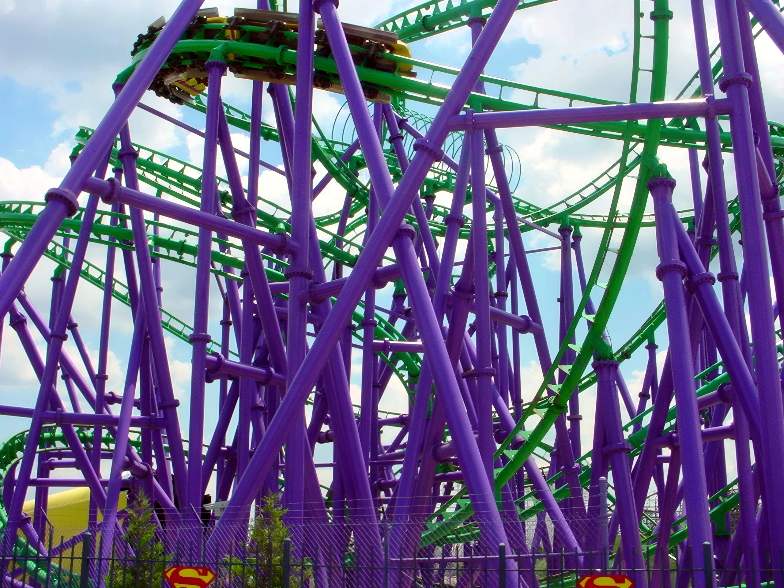 A Joker's Jinx train high in the purple supports at Six Flags America, July 2001