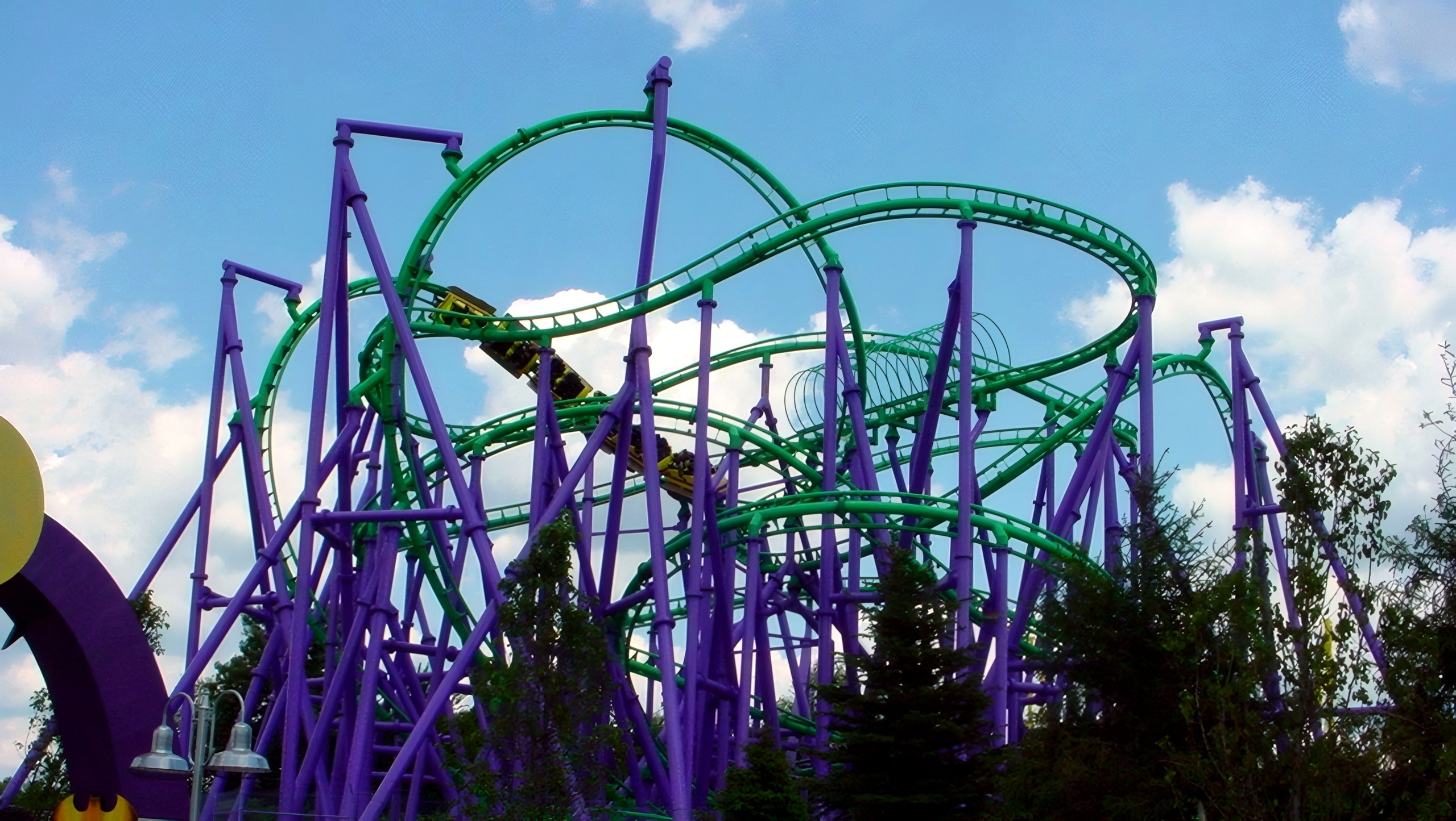 A Joker's Jinx train threading the green track at Six Flags America, July 2001