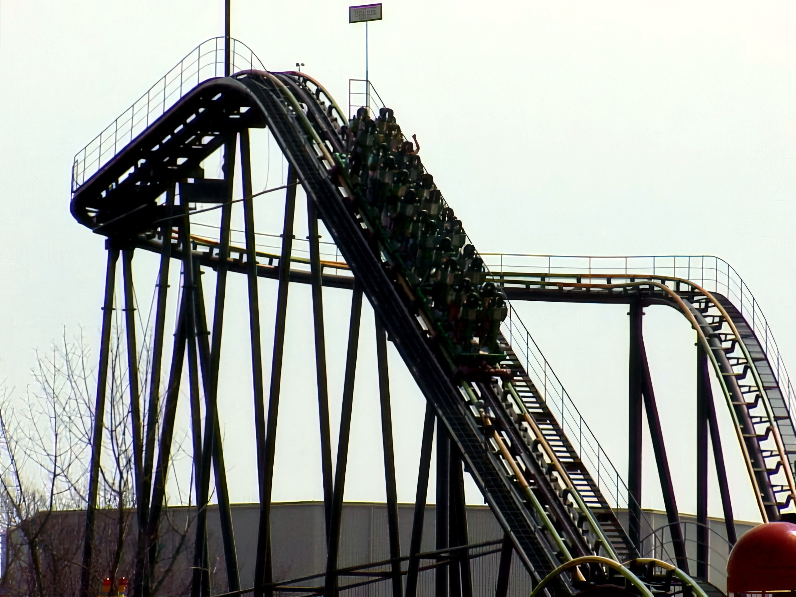A King Cobra train of standing riders on the lift hill at Paramount's Kings Island, April 2001