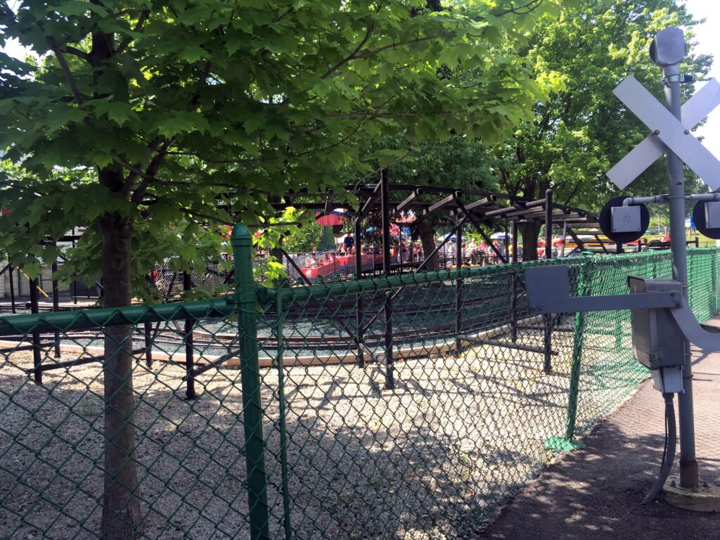 The railroad-crossing sign and track beyond the fence, Little Dipper, May 2016