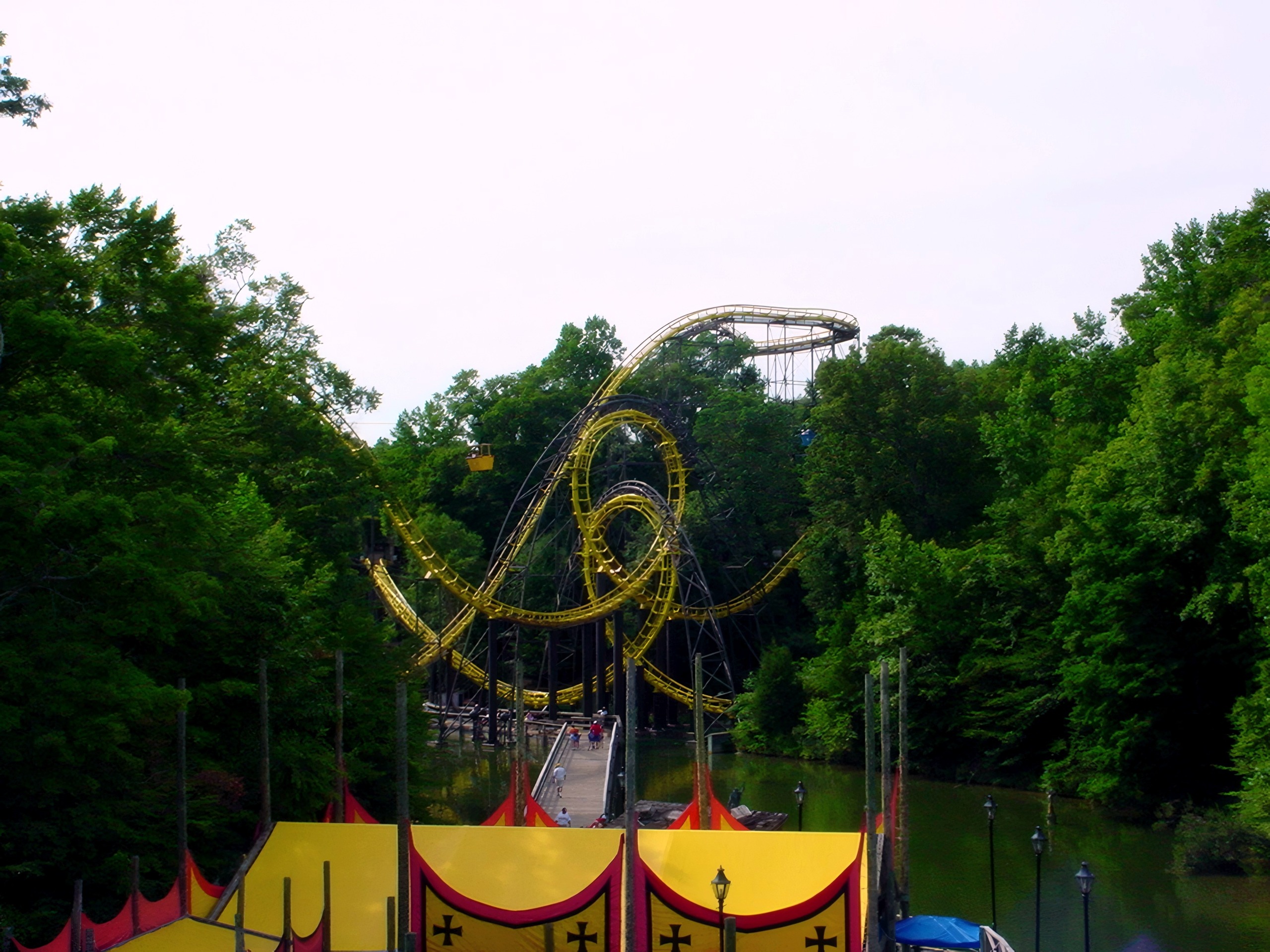 The Loch Ness Monster's loops seen across the Rhine River with a festival tent below at Busch Gardens Williamsburg, July 2001