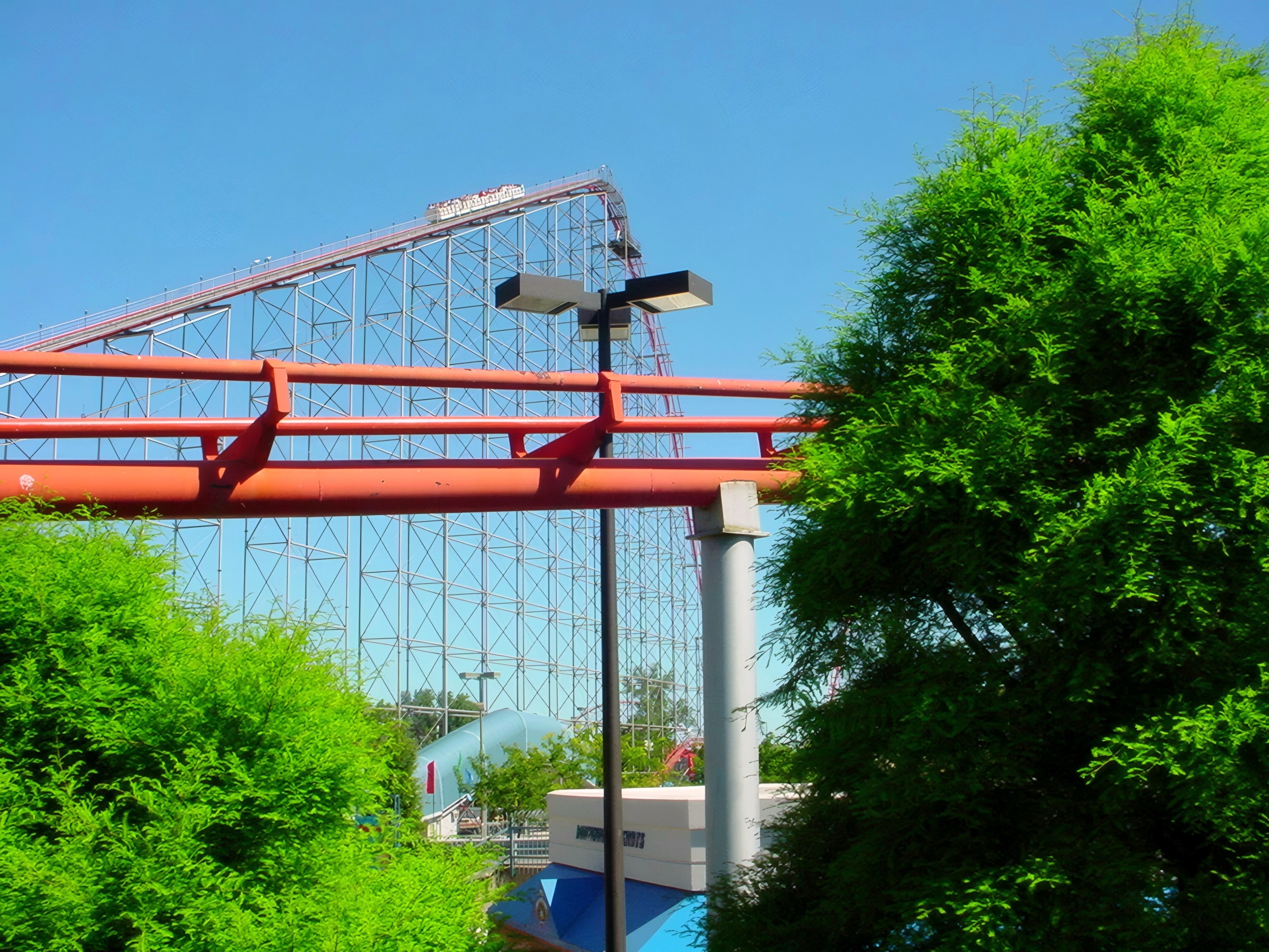 Magnum XL-200's red track passing overhead with the lift hill behind at Cedar Point, July 2003