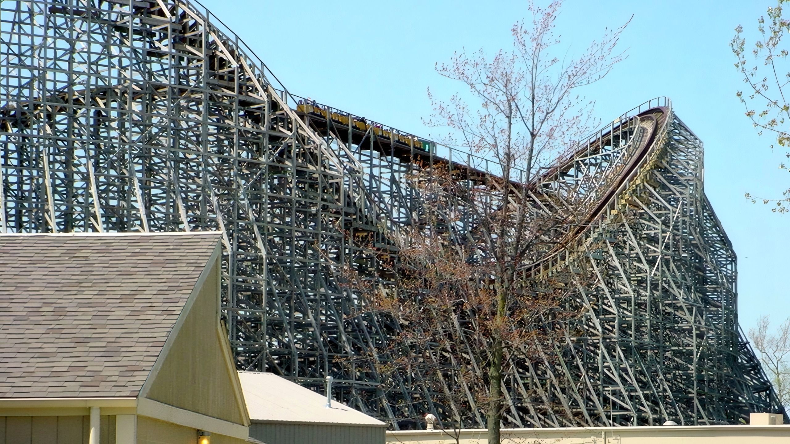 A Mean Streak train descending a hill on the wooden structure at Cedar Point, May 2002