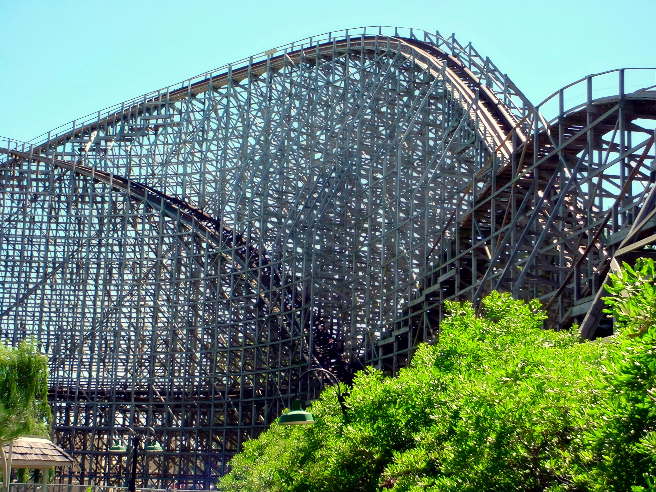 Mean Streak's hills and wooden structure behind the trees at Cedar Point, July 2003
