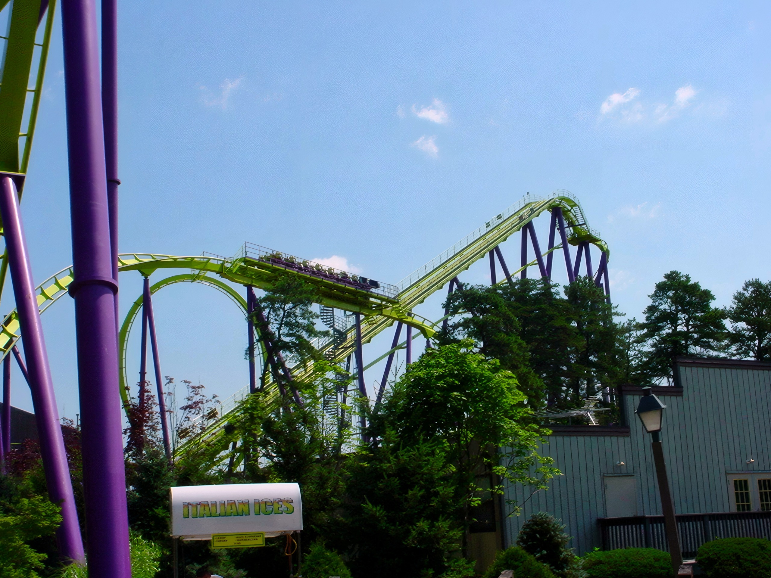 Medusa's lime-green track and purple supports against the sky at Six Flags Great Adventure, July 2001