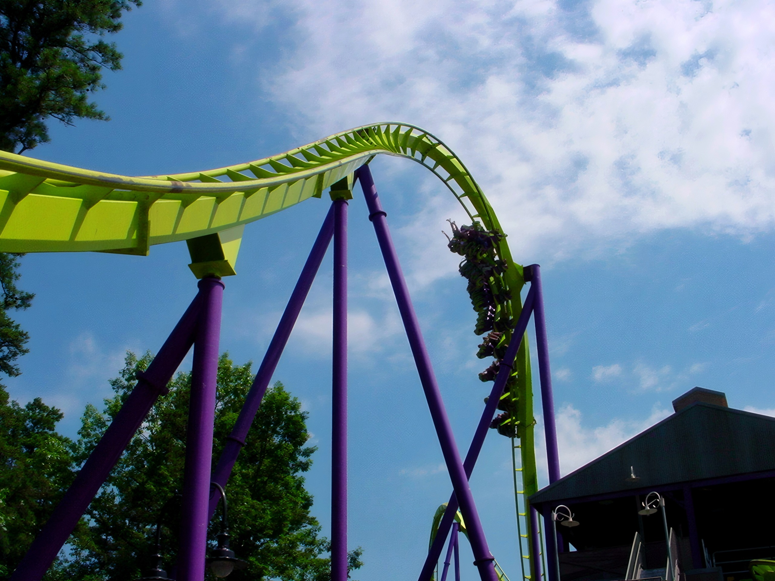 A Medusa floorless train heading down the first drop at Six Flags Great Adventure, July 2001