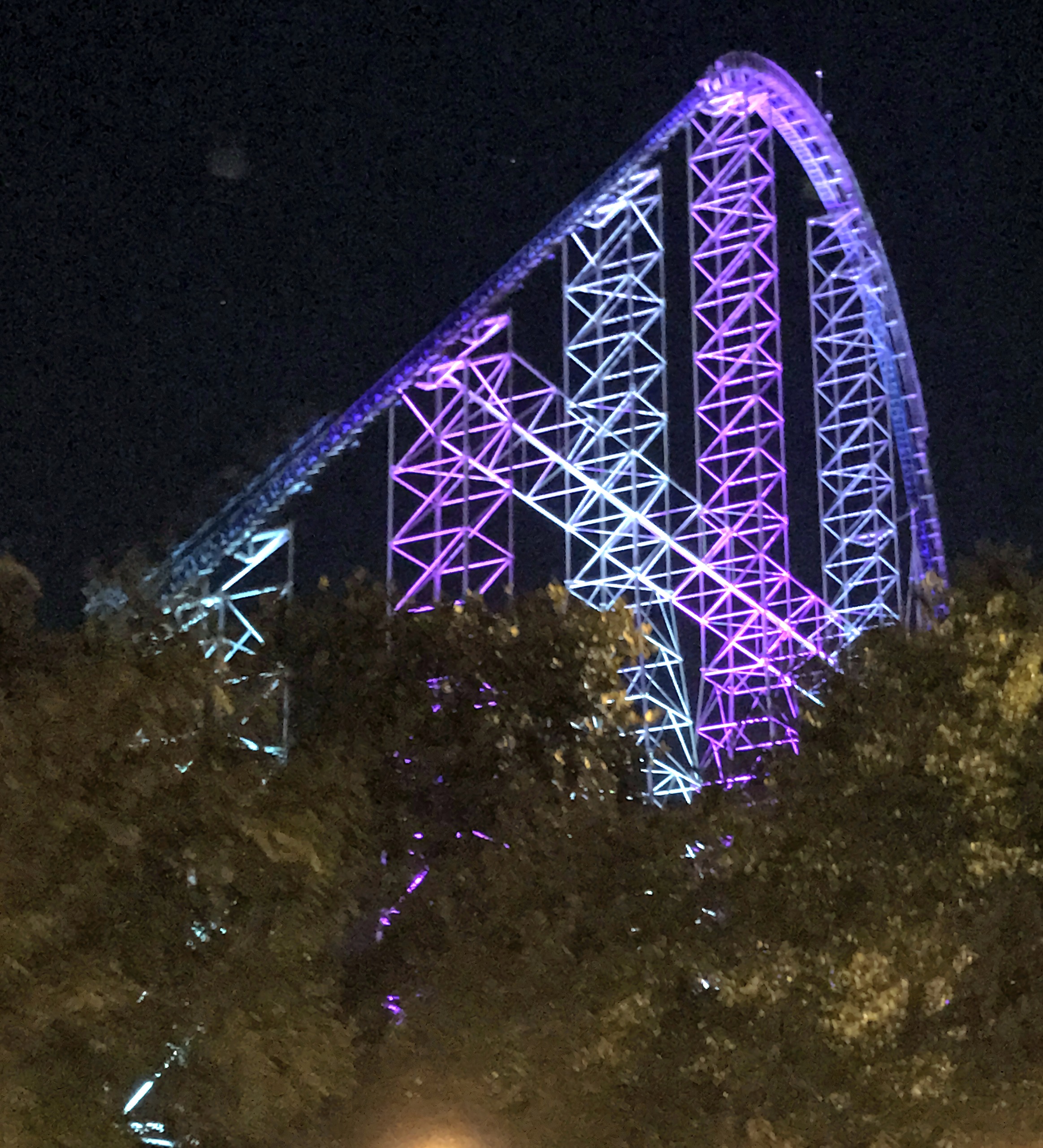 Coaster lift hill lit purple against night sky, Millennium Force, October 2016