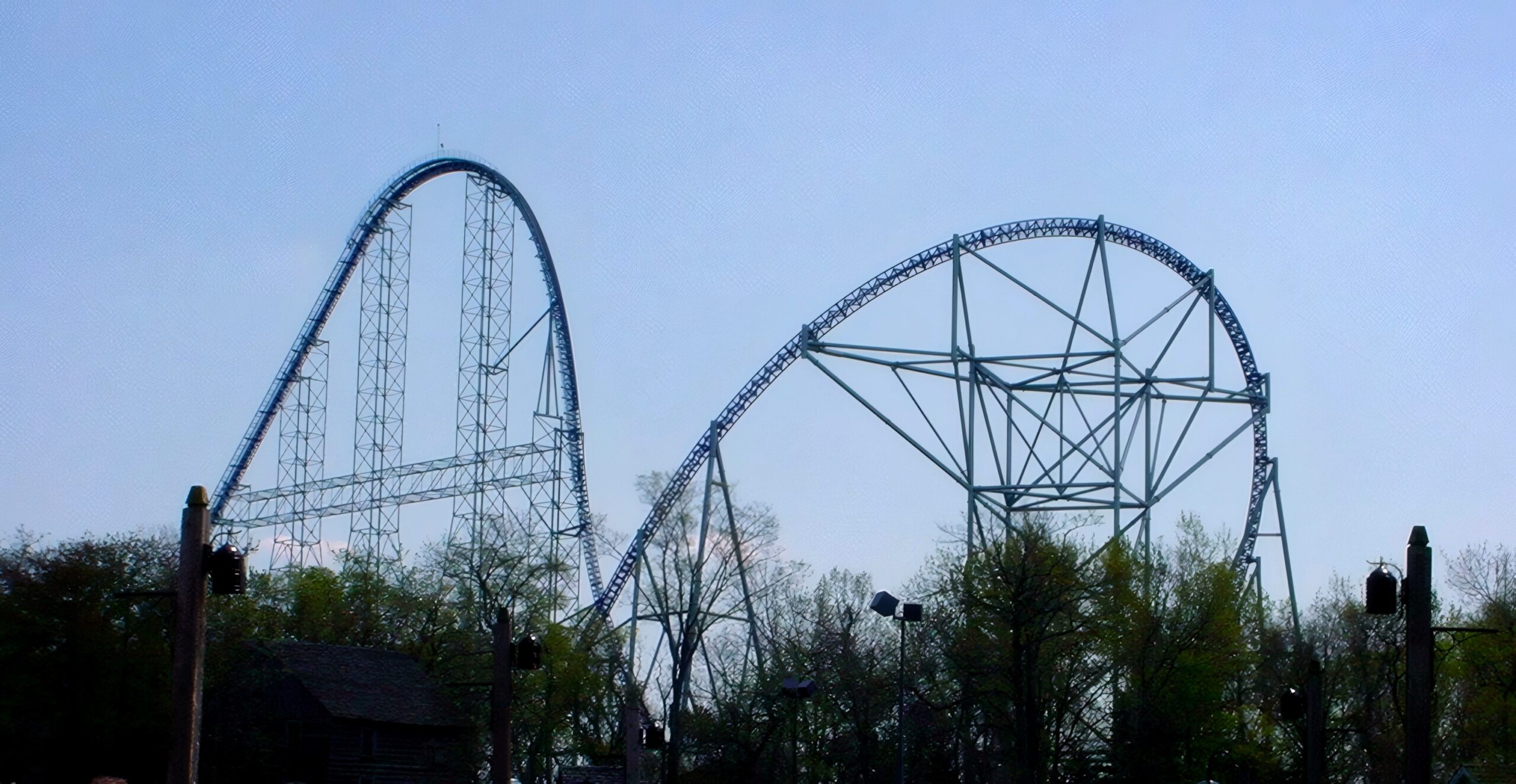Millennium Force's lift hill and overbank rising over Frontier Town, May 2002