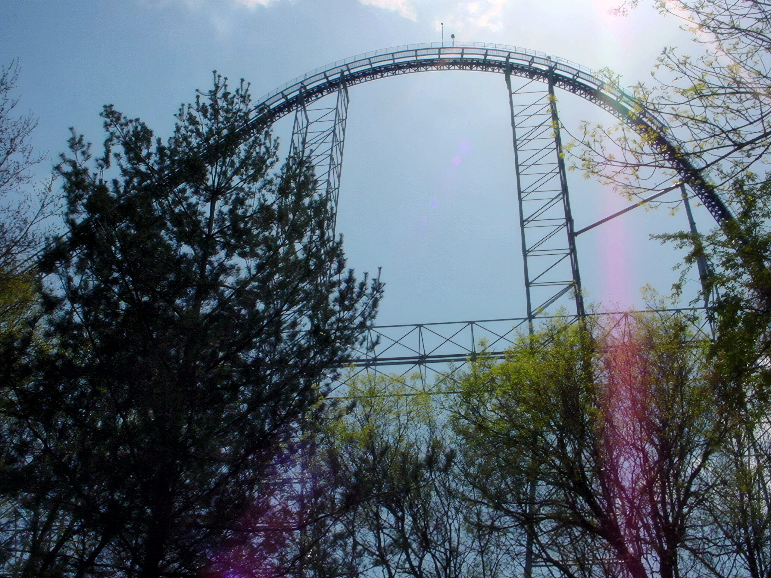 The crest of Millennium Force's lift hill against the sun, May 2002