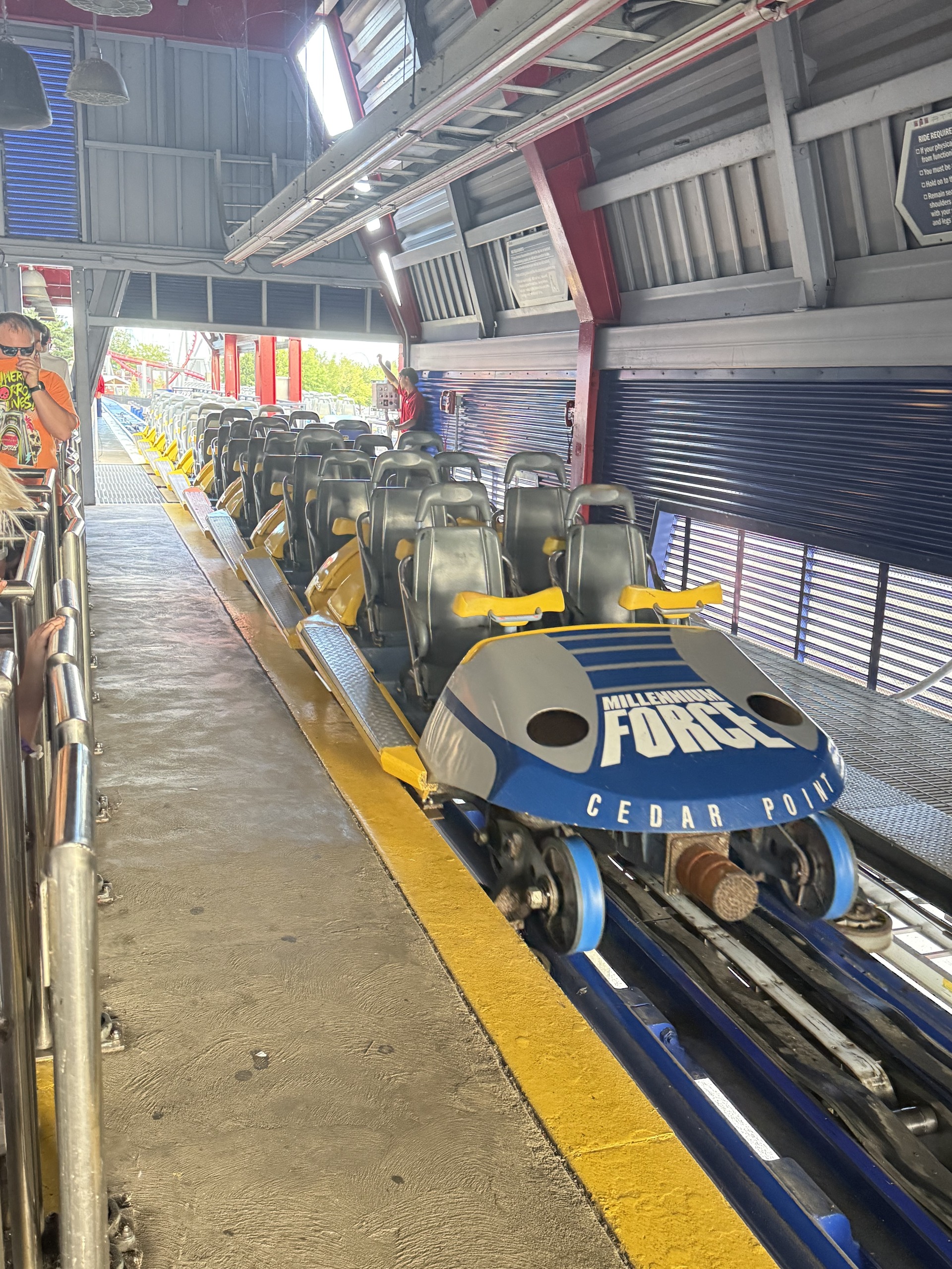 The nose of a Millennium Force train in the station, shot from a low angle