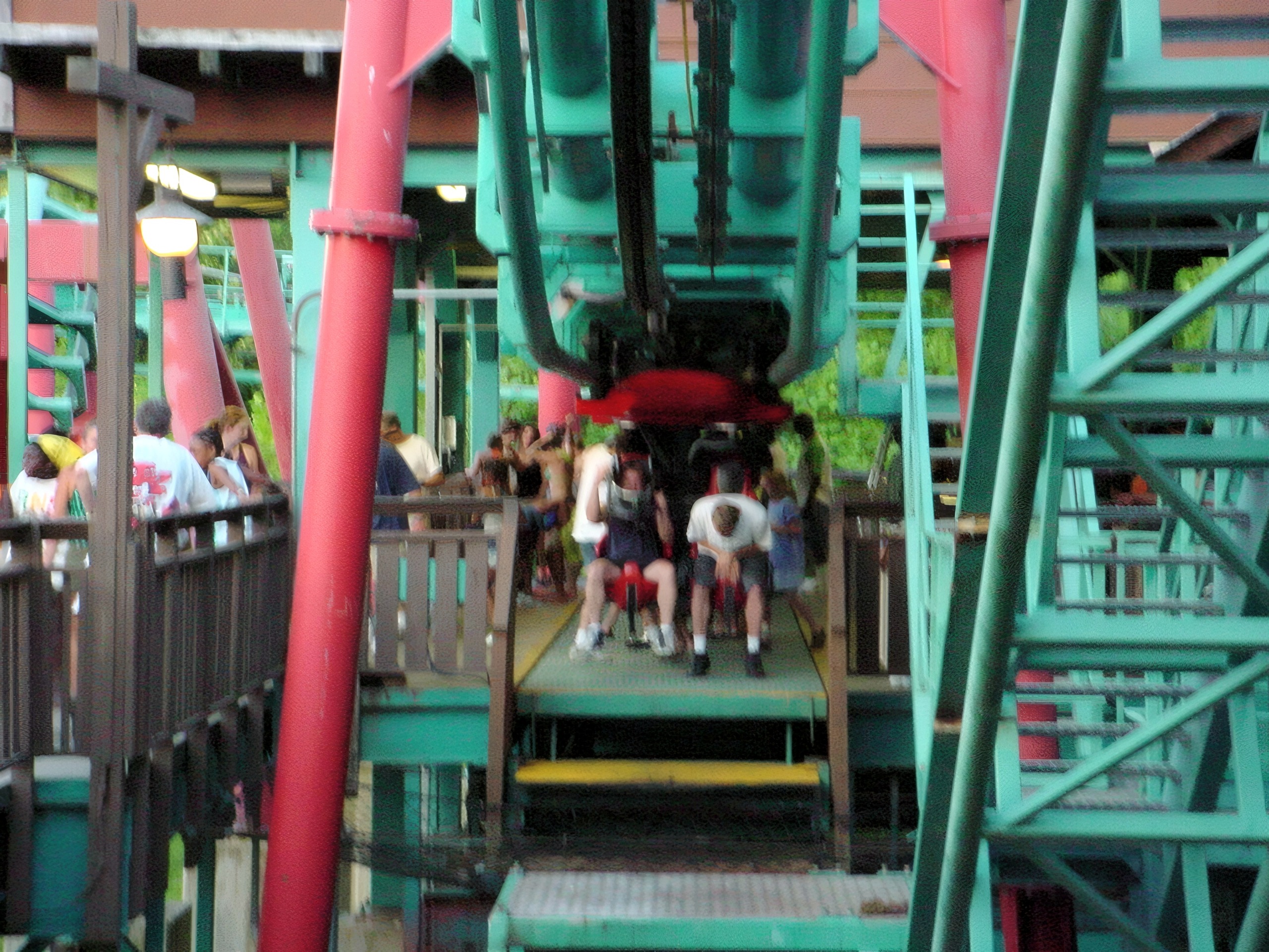 Riders boarding a Mind Eraser train in the station at Six Flags America, July 2001