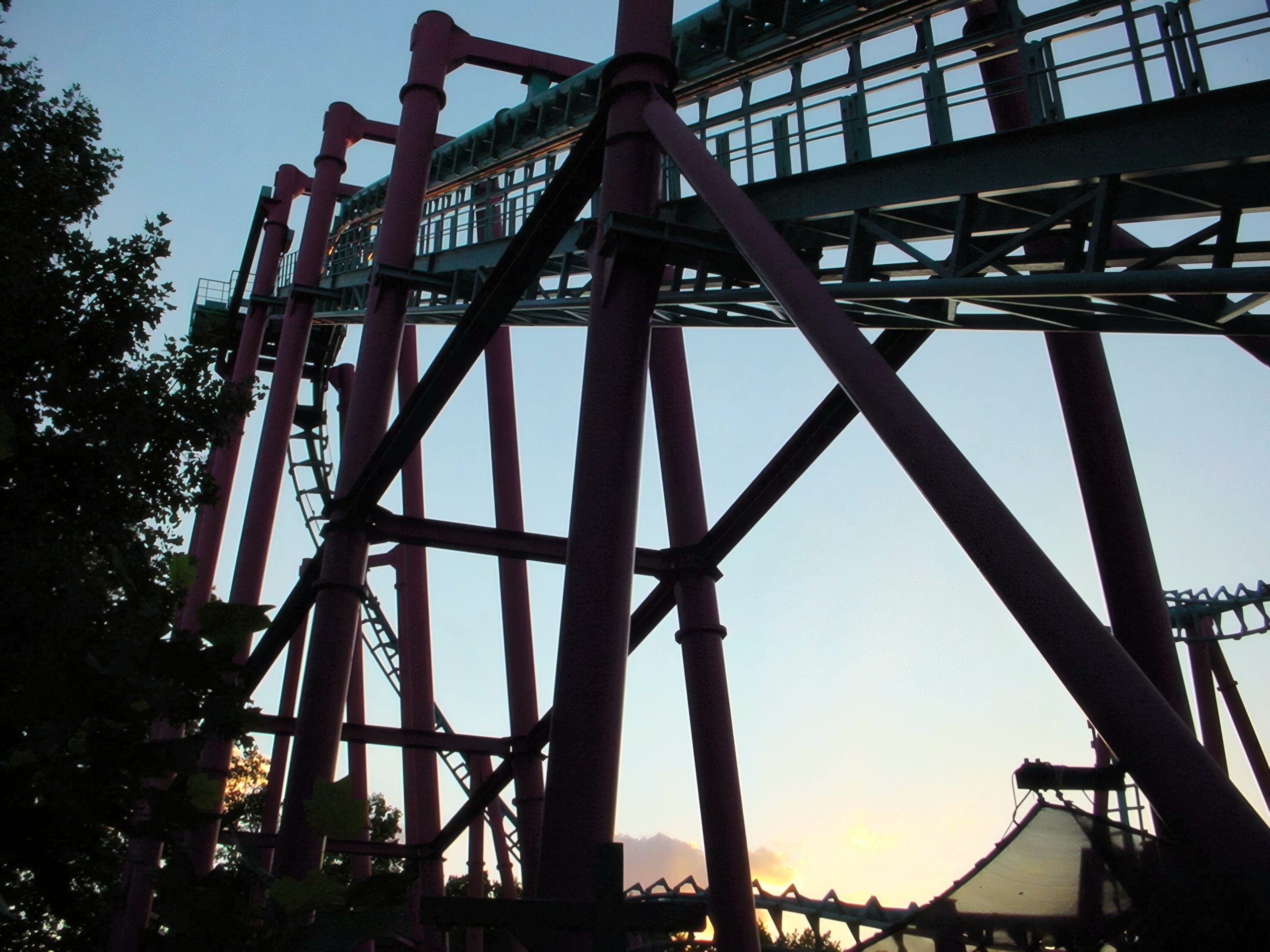 Mind Eraser's supports silhouetted at dusk at Six Flags America, July 2001
