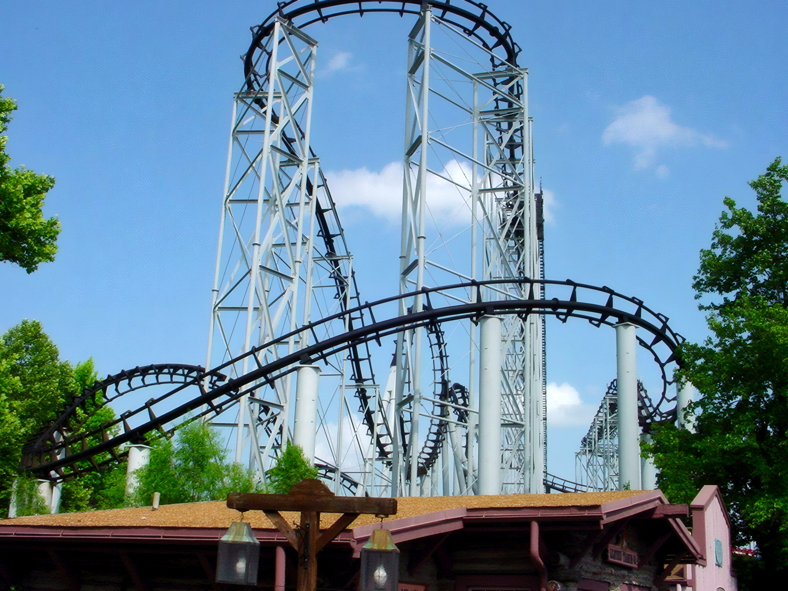 The Ninja lift hill, loop and layout above the trees at Mid America Adventure, June 2002