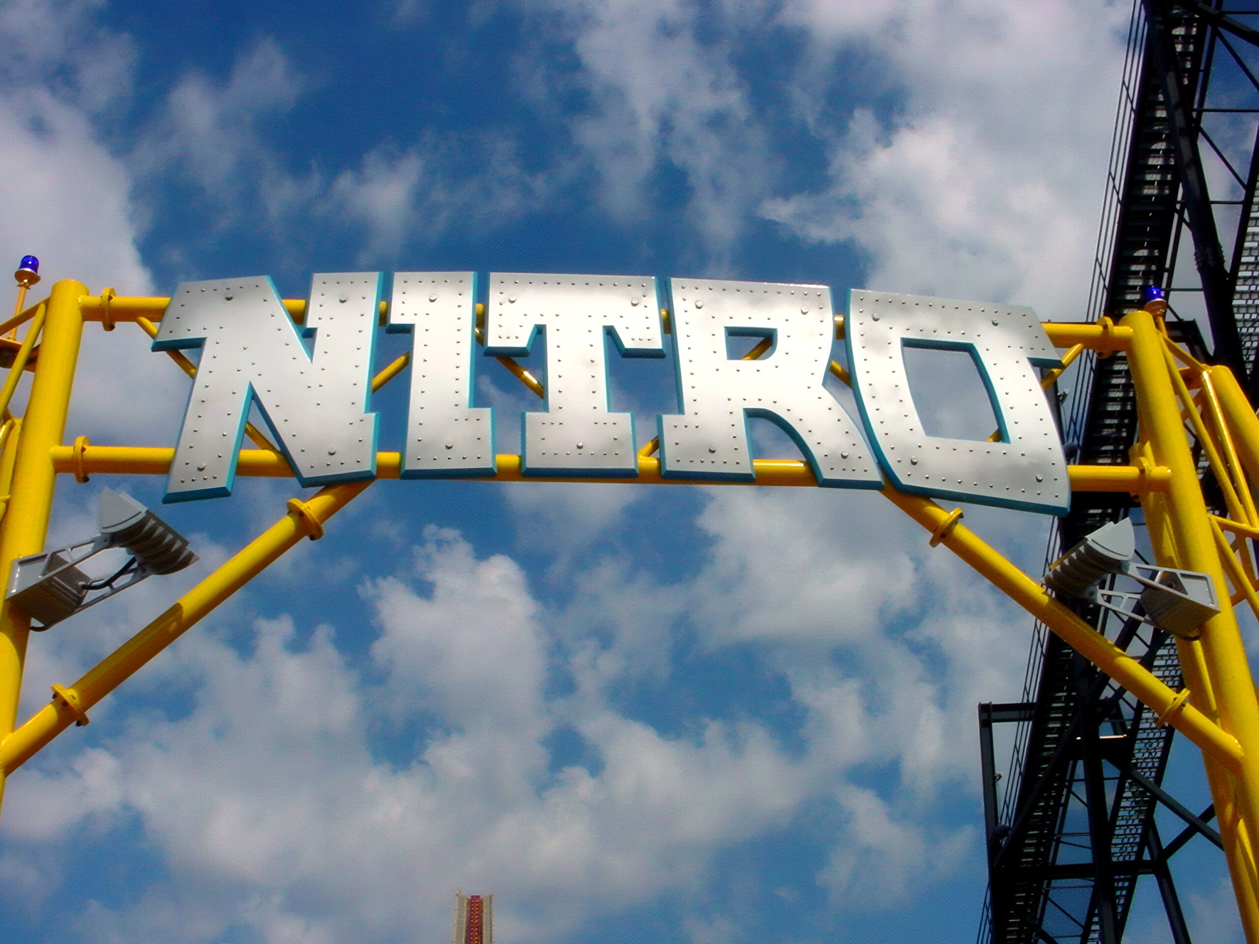 The original Nitro entrance sign against the sky, July 2001