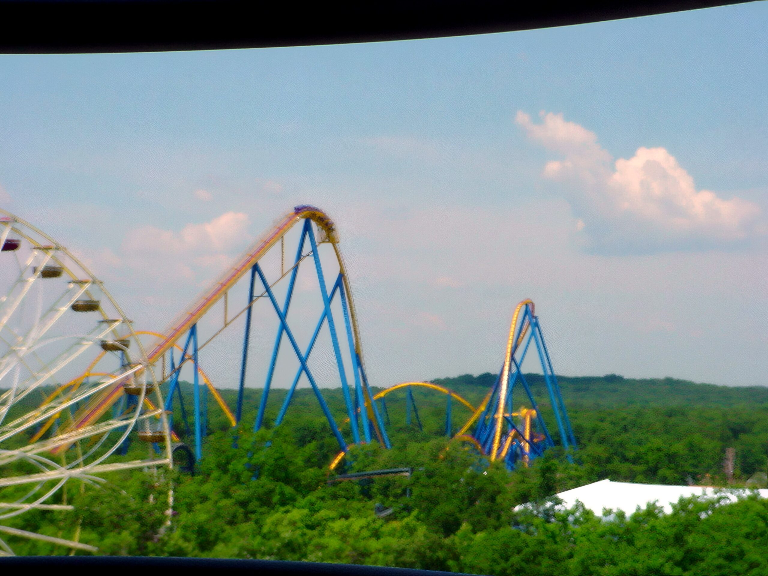 Nitro's lift hill and first drop with the Ferris wheel in front, July 2001