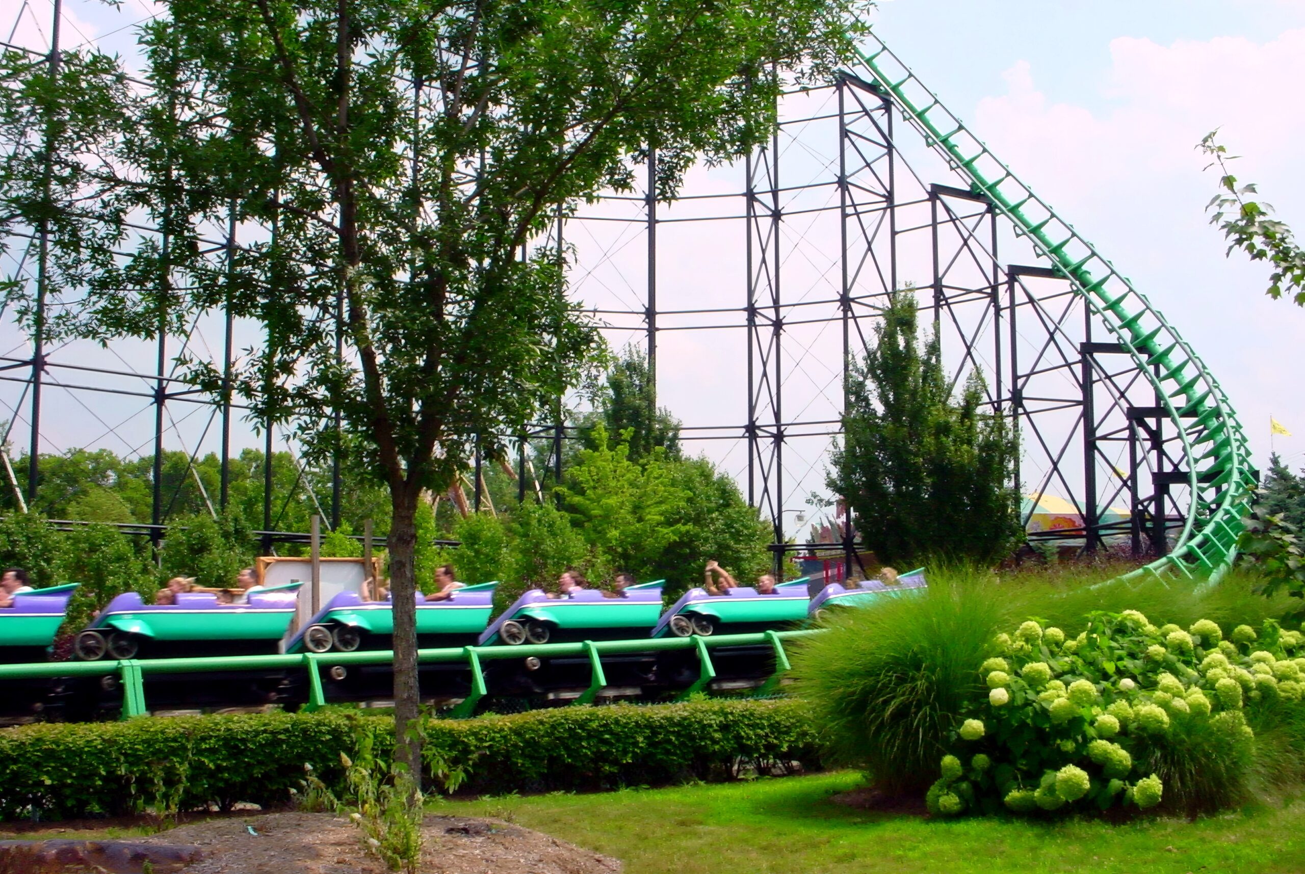 A Phantom's Revenge train returning past the gardens, July 2003