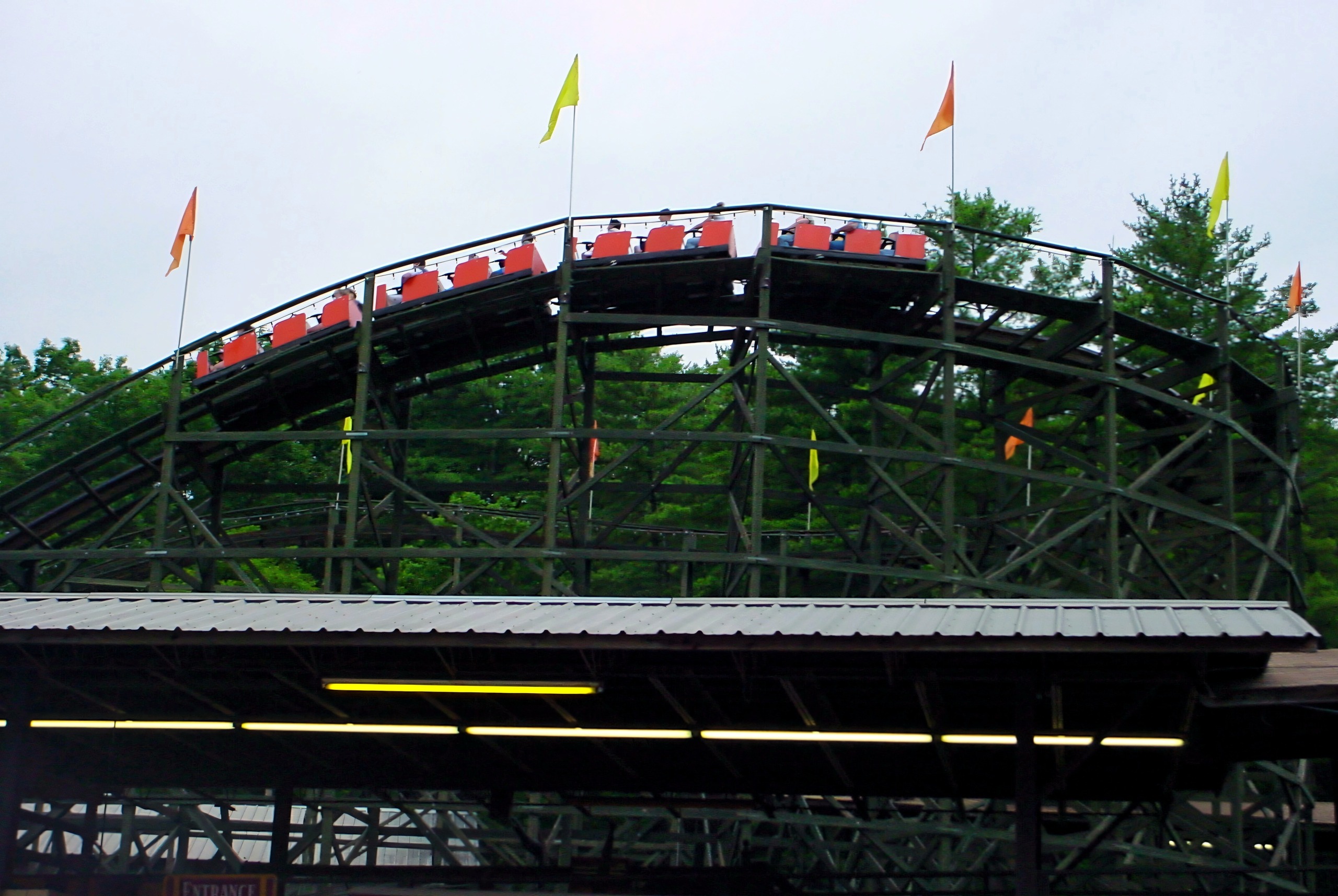 A Phoenix train climbing the lift hill lined with flags, July 2003