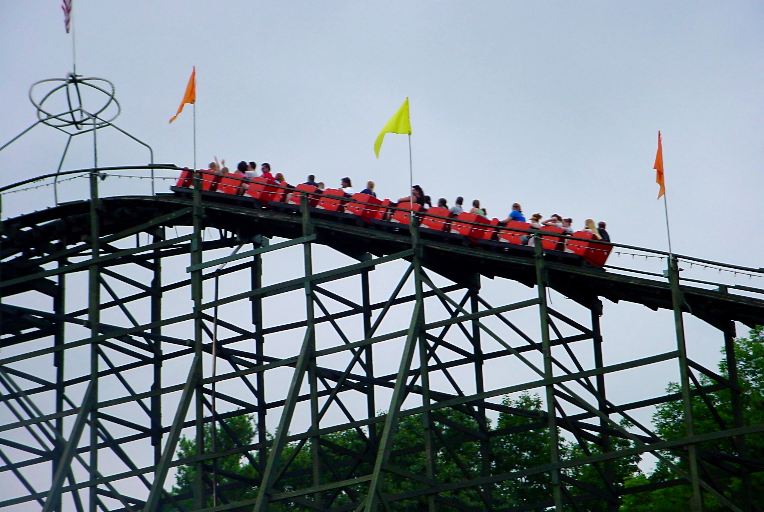 A Phoenix train cresting the lift hill under the flags, July 2003