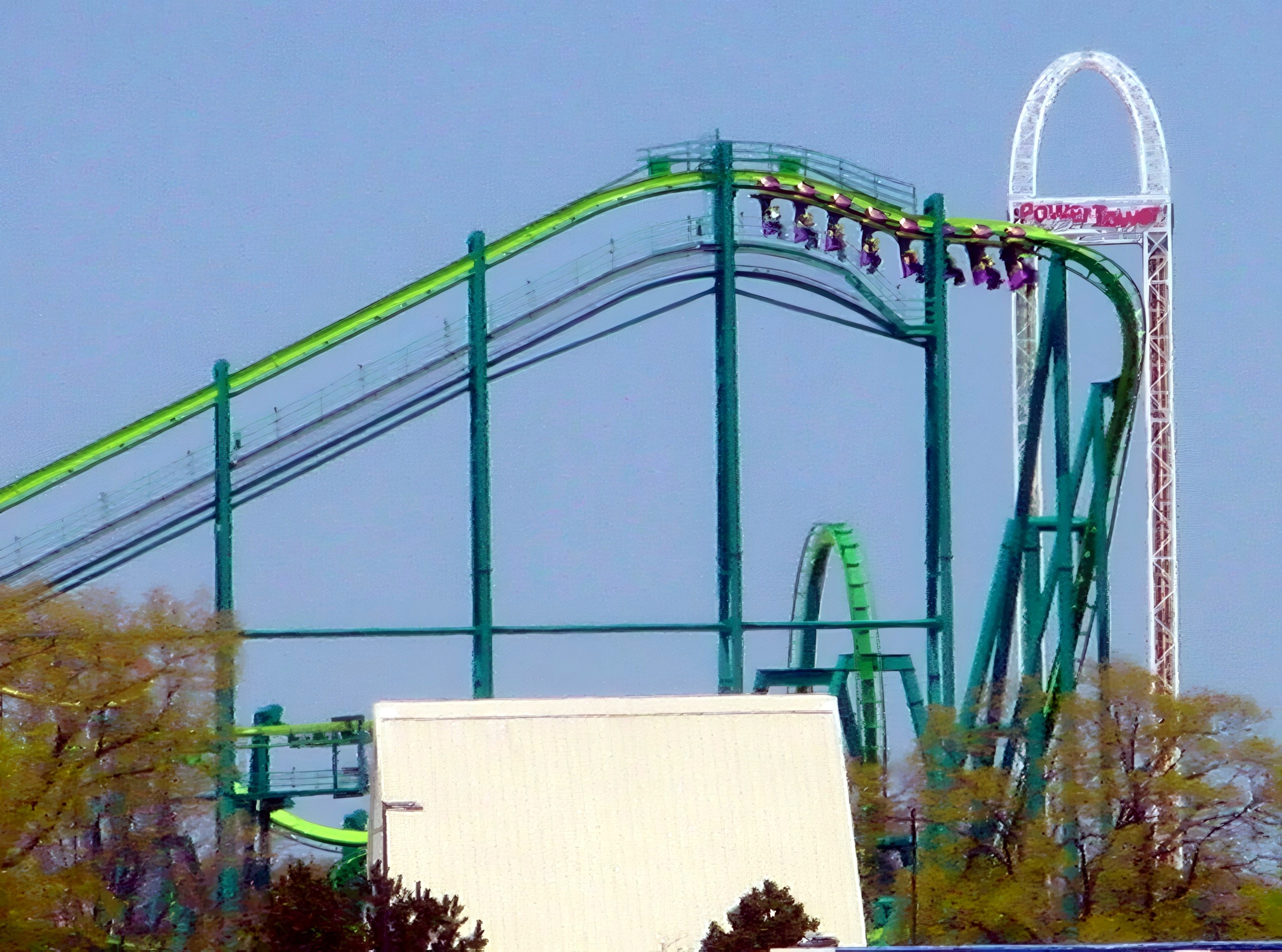 Green coaster train on track beside Power Tower, Raptor, May 2002