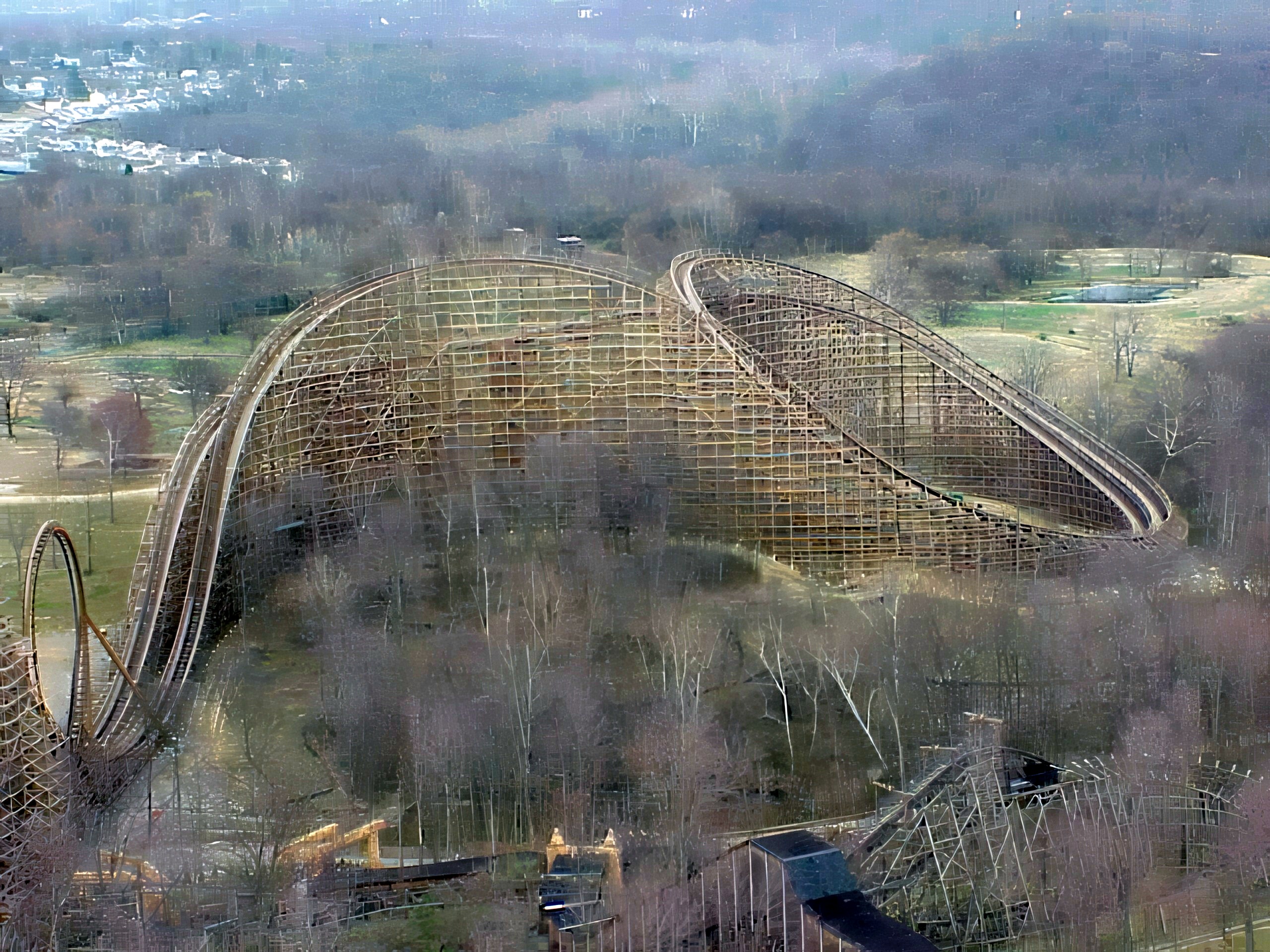 Son of Beast's hills winding through the bare woods, seen from the Eiffel Tower at Kings Island, April 2001