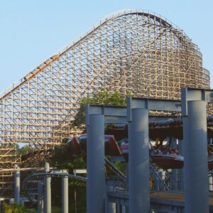Son of Beast at Kings Island: a train topping the hill behind Top Gun's steel supports and trains