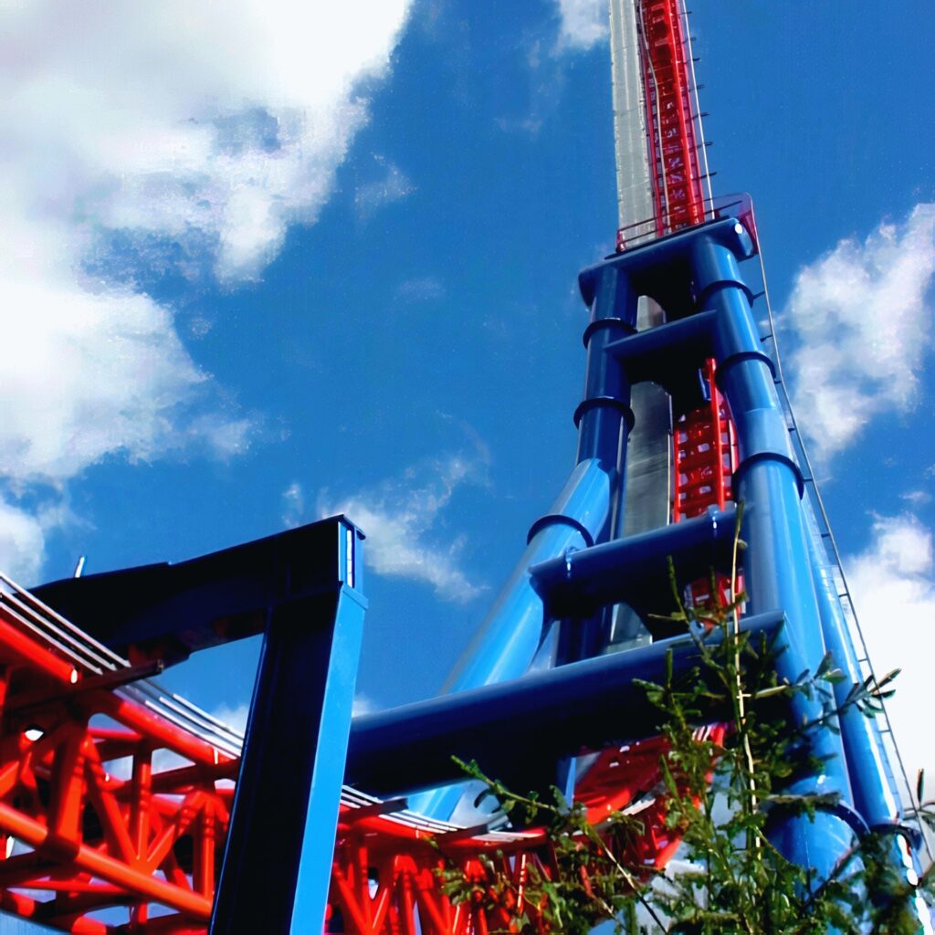 Superman: Ultimate Escape, later Steel Venom, at Six Flags Ohio: the rear spike's blue supports and red track against the sky