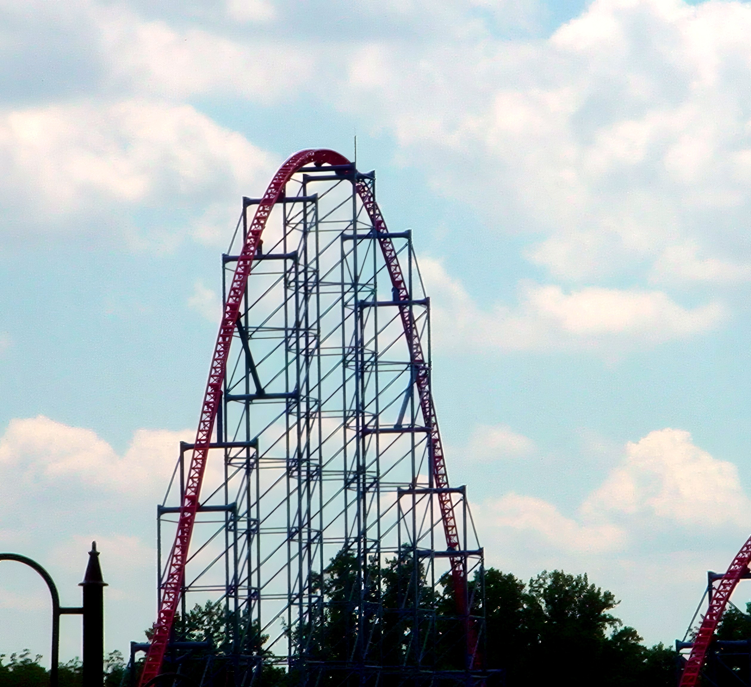 Superman: Ride of Steel's lift hill and first drop against the sky at Six Flags America, July 2001