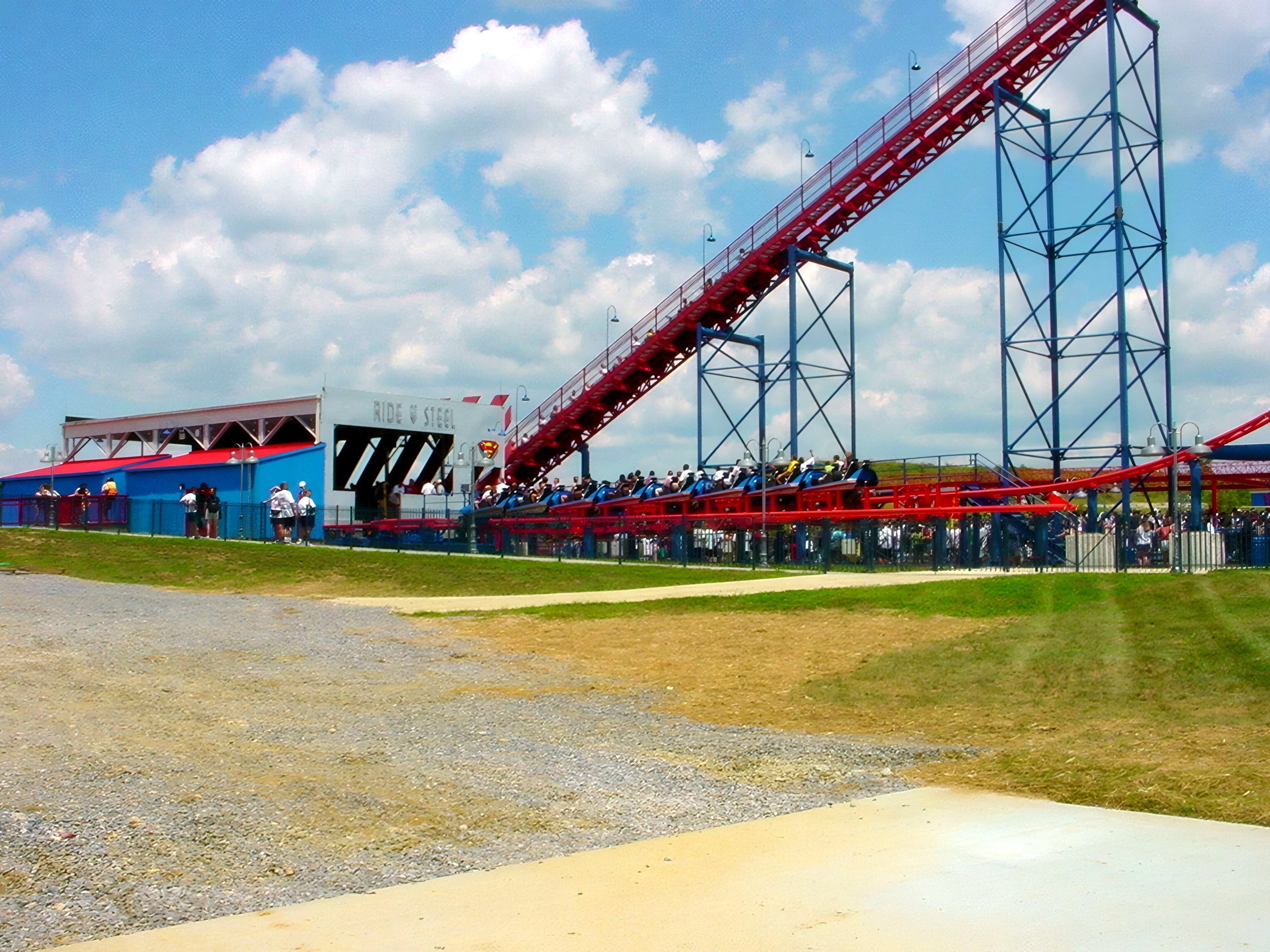 Superman: Ride of Steel's red lift hill above the station sign at Six Flags America, July 2001