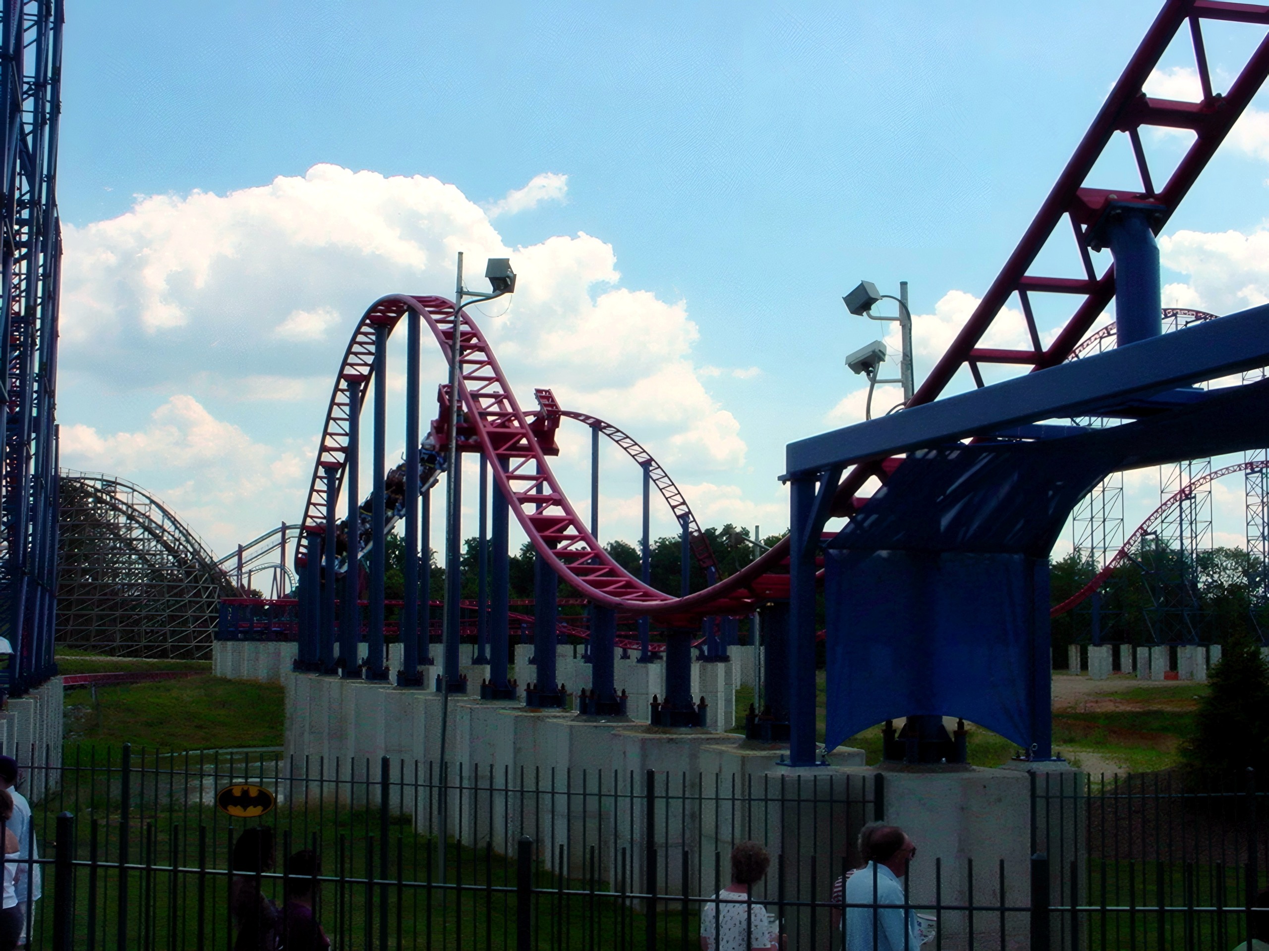 Superman: Ride of Steel's red track turning beside the blue lift structure at Six Flags America, July 2001