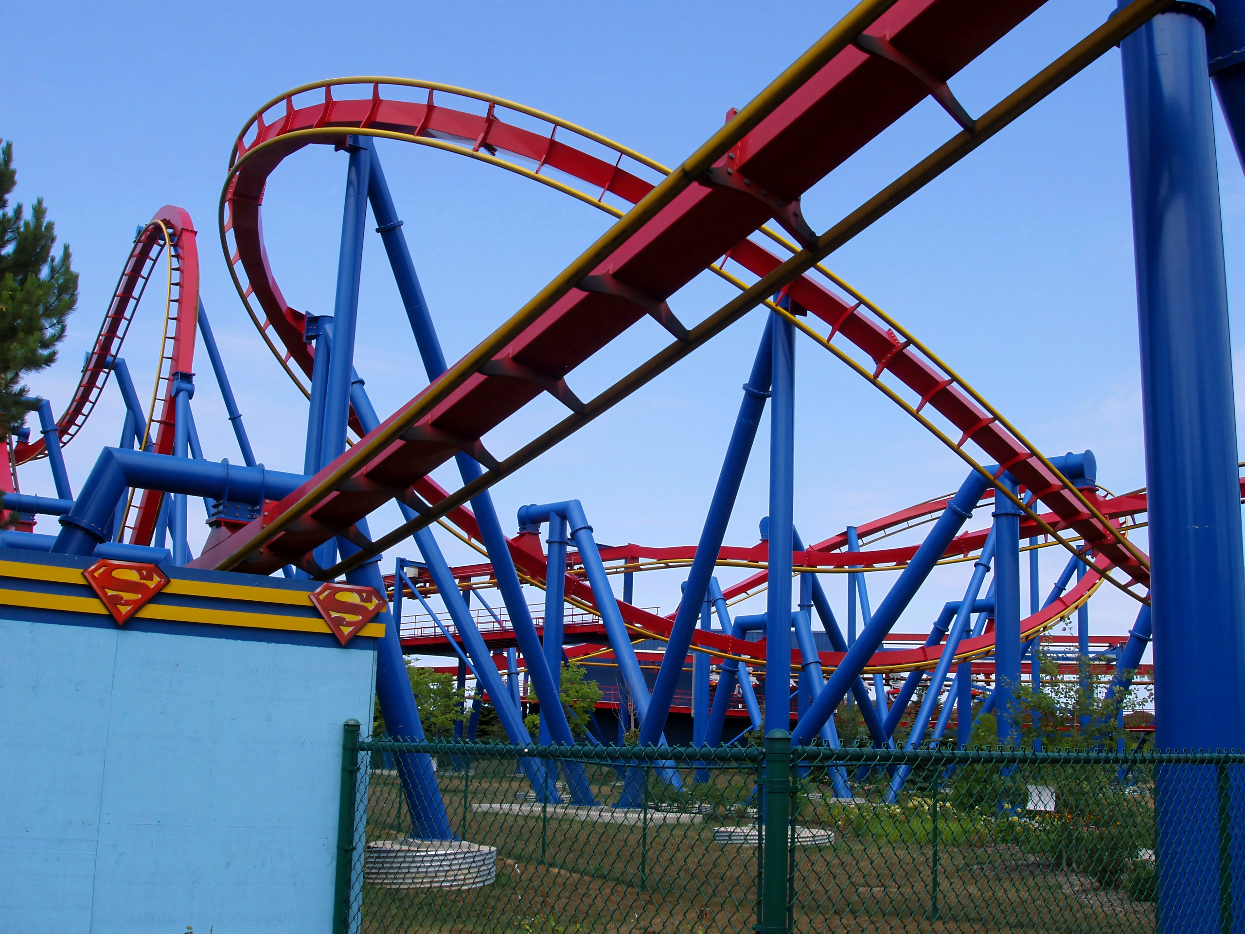 The Superman shield sign with the track behind at Six Flags Great America, August 2005