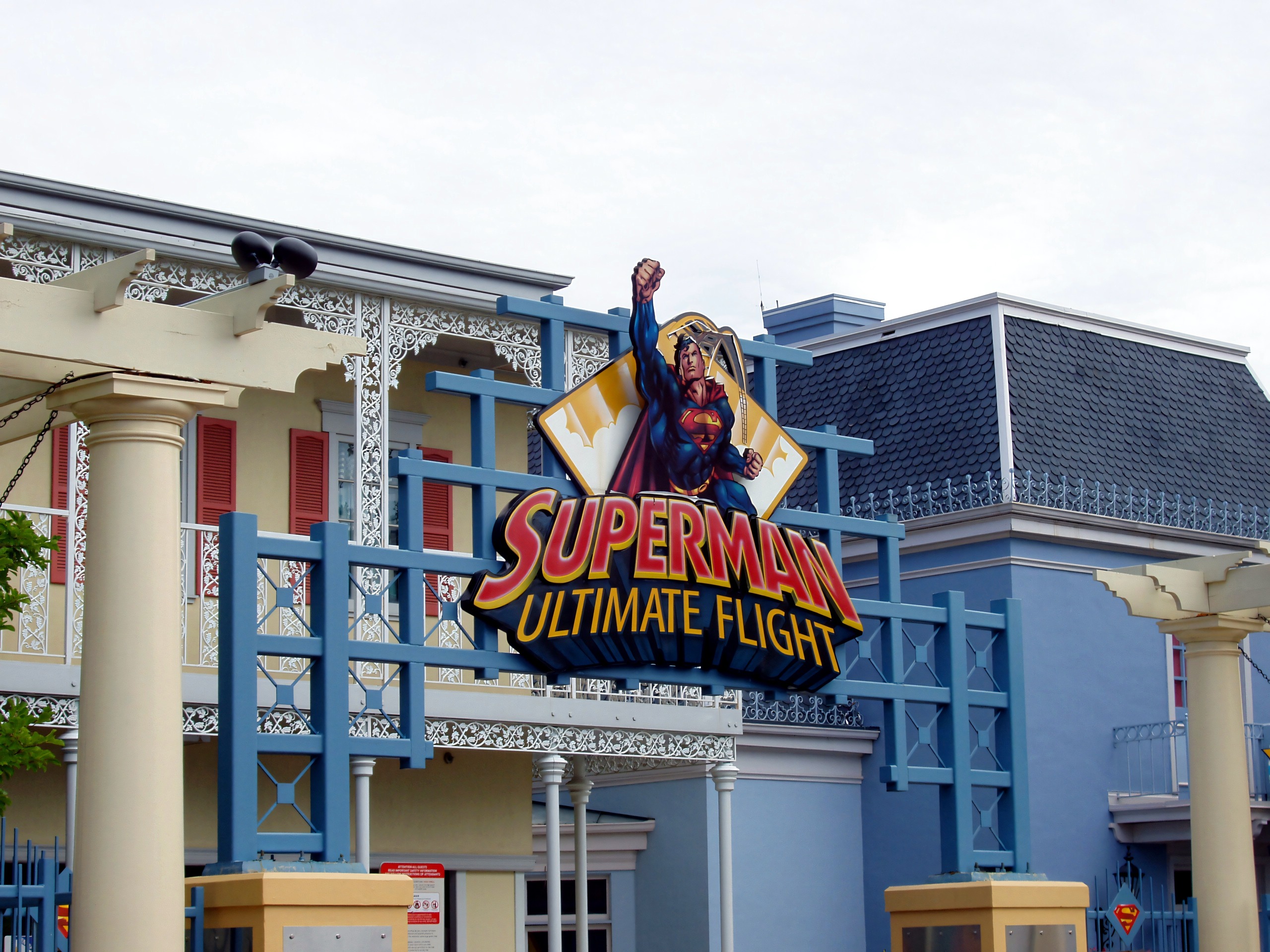 The Superman: Ultimate Flight sign above the pastel entrance building at Six Flags Great America, August 2005