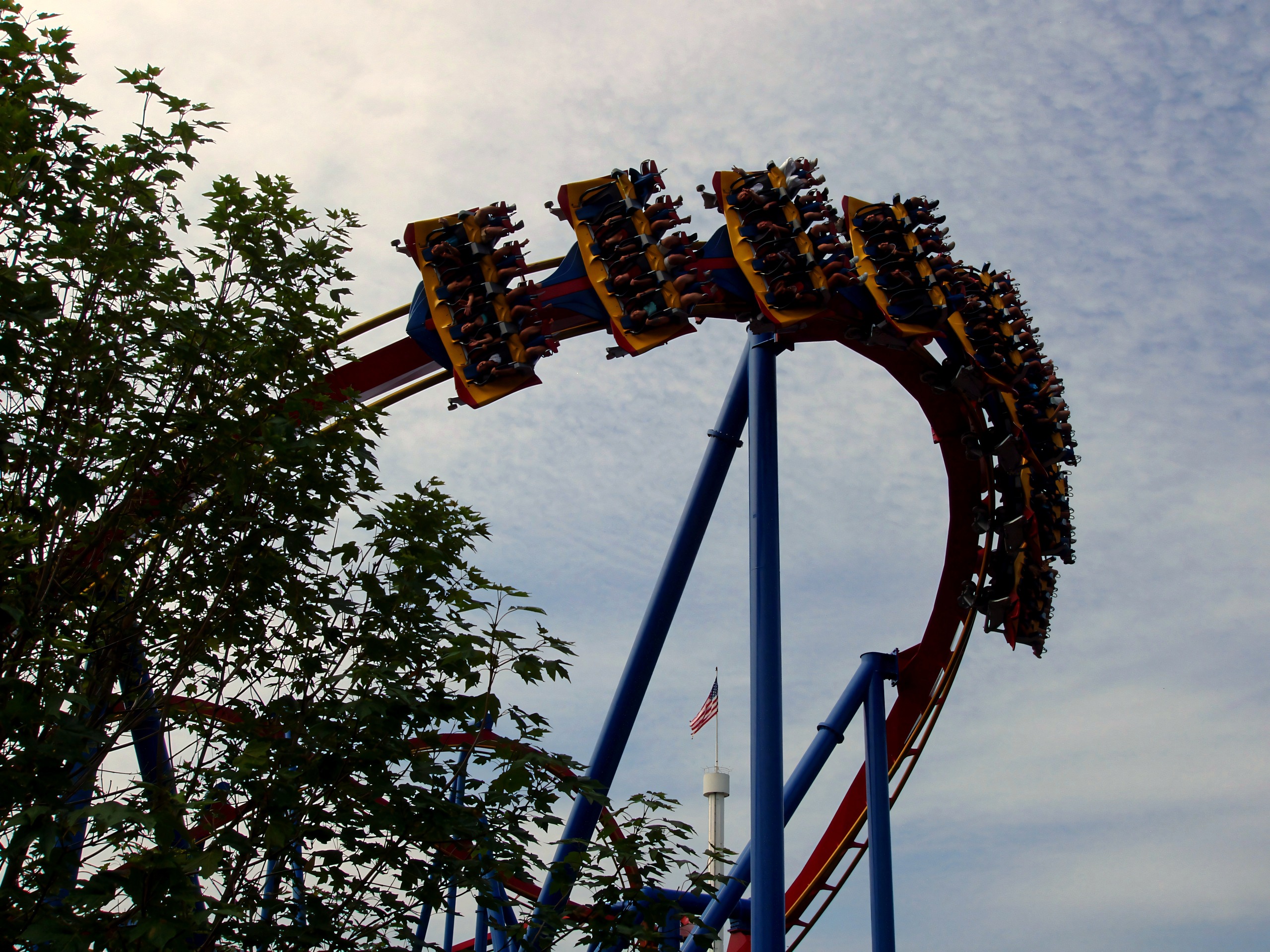 A Superman: Ultimate Flight train, riders prone, through the loop at Six Flags Great America, August 2005