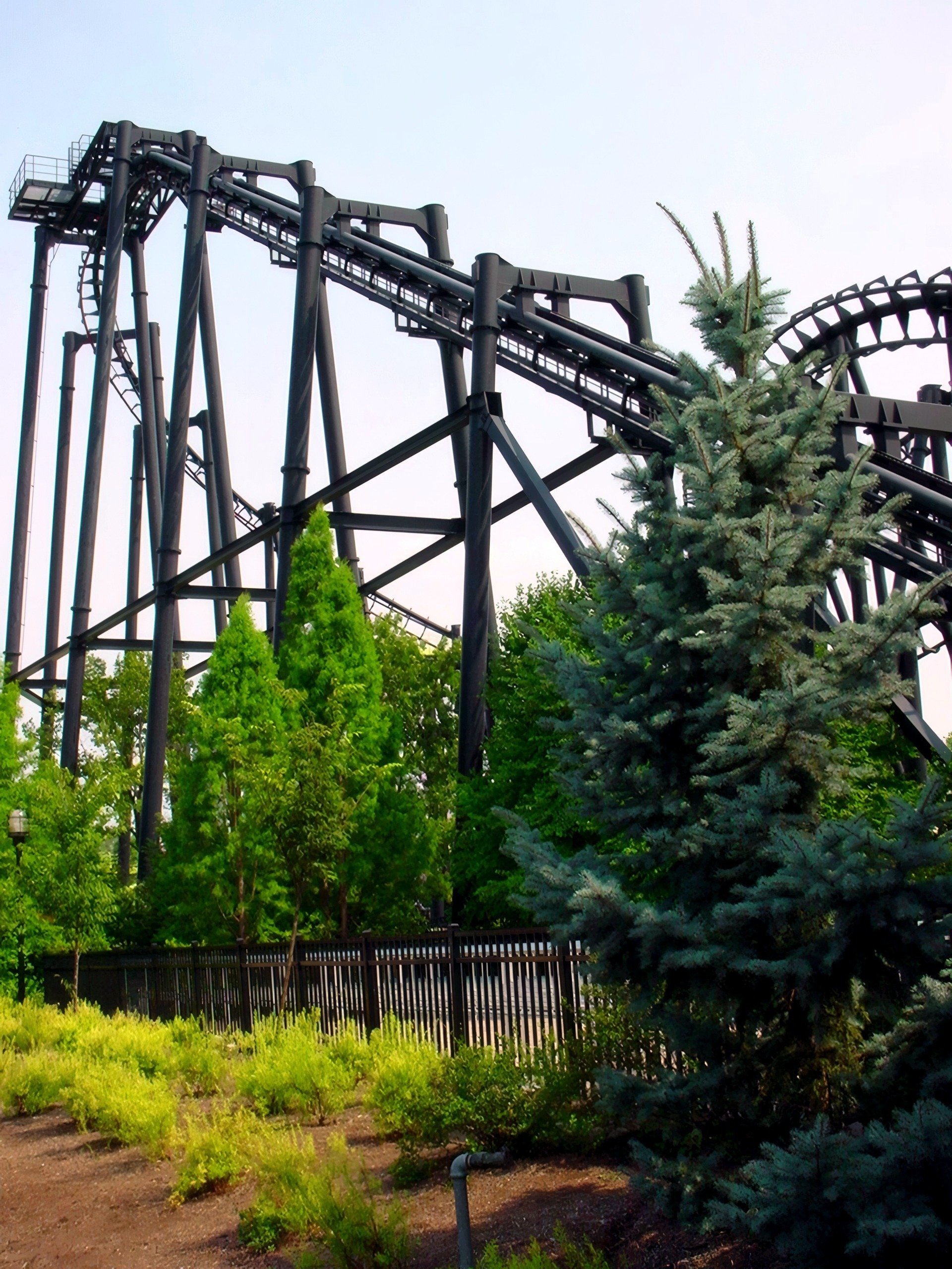 Close-up of black coaster track and lattice support structure, T2, July 2002
