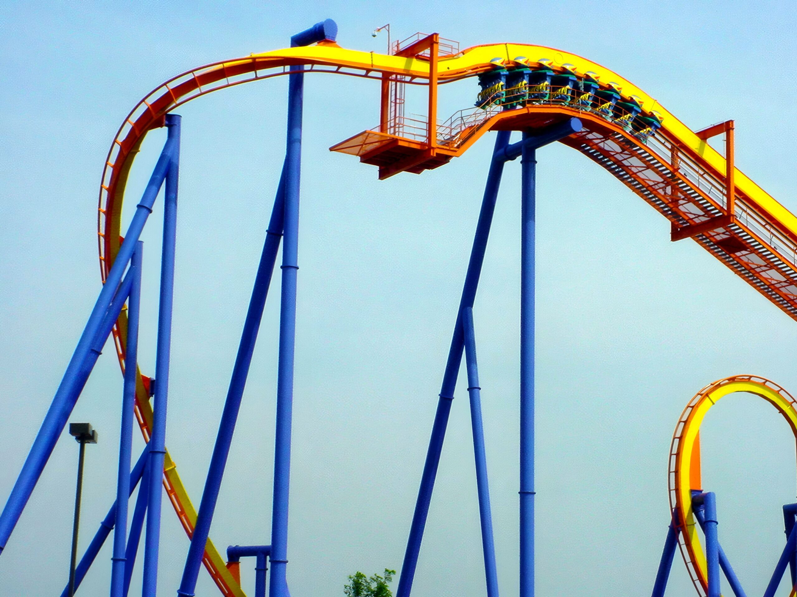 A Talon train hanging through the vertical loop, July 2001