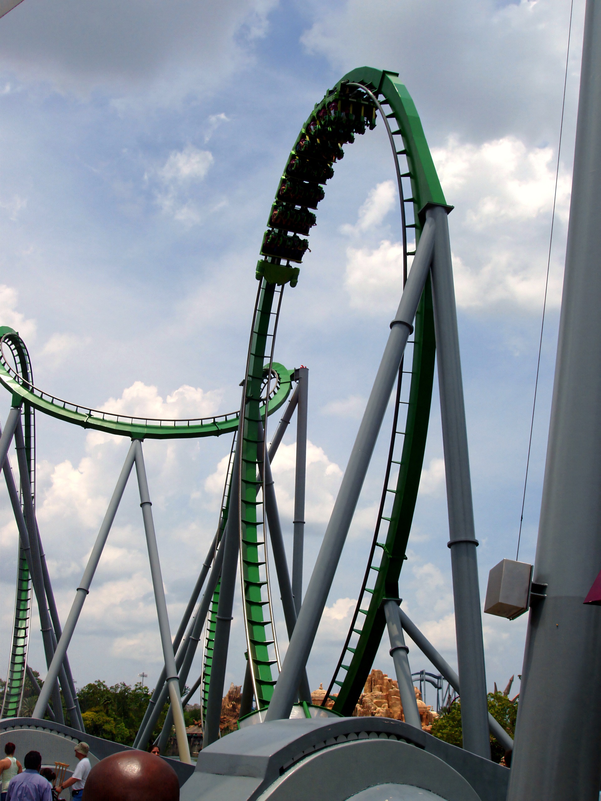 Train looping through the green track structure, The Incredible Hulk Coaster, July 2006