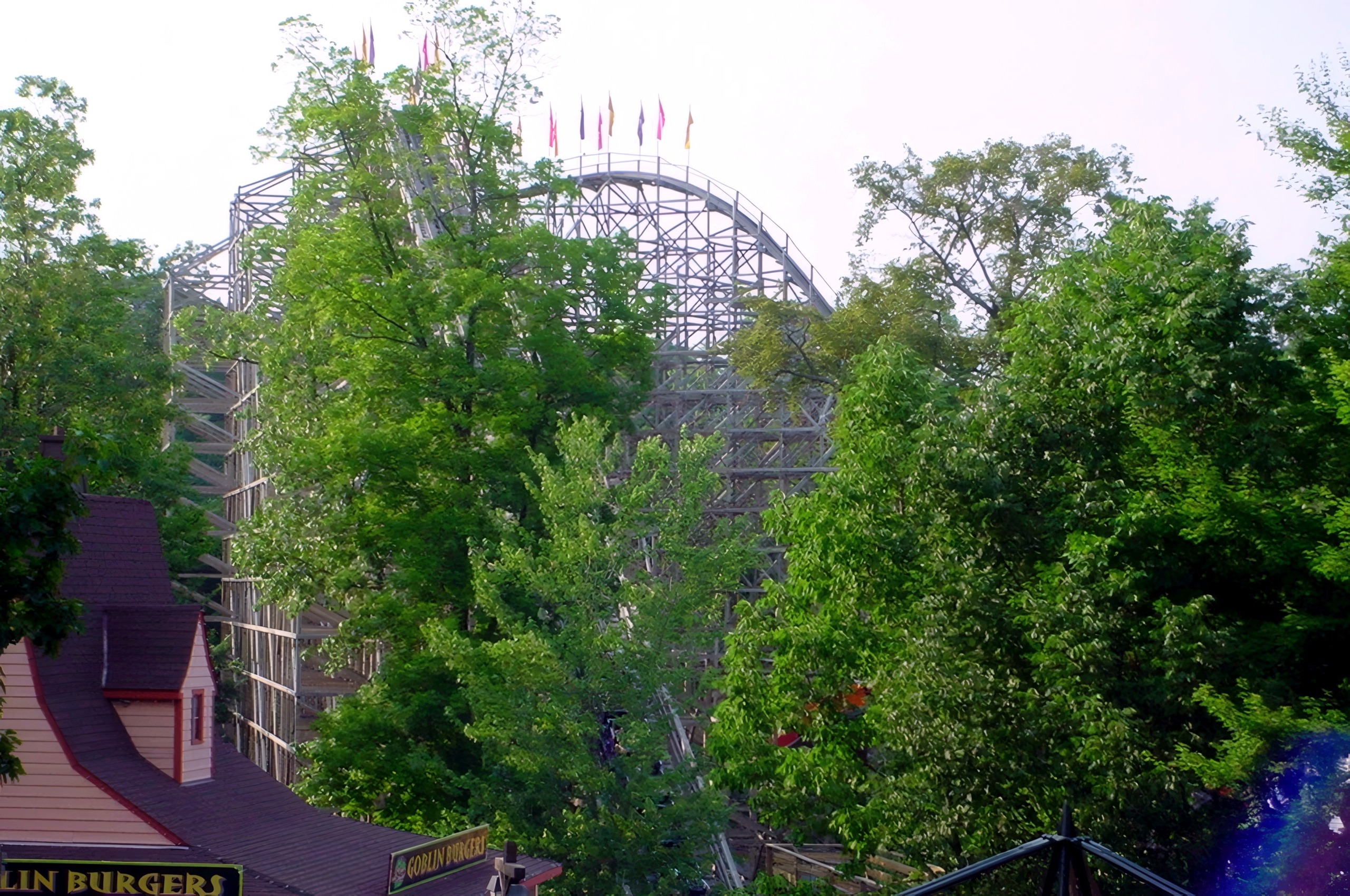 The Legend rising above the trees near Goblin Burgers, July 2002