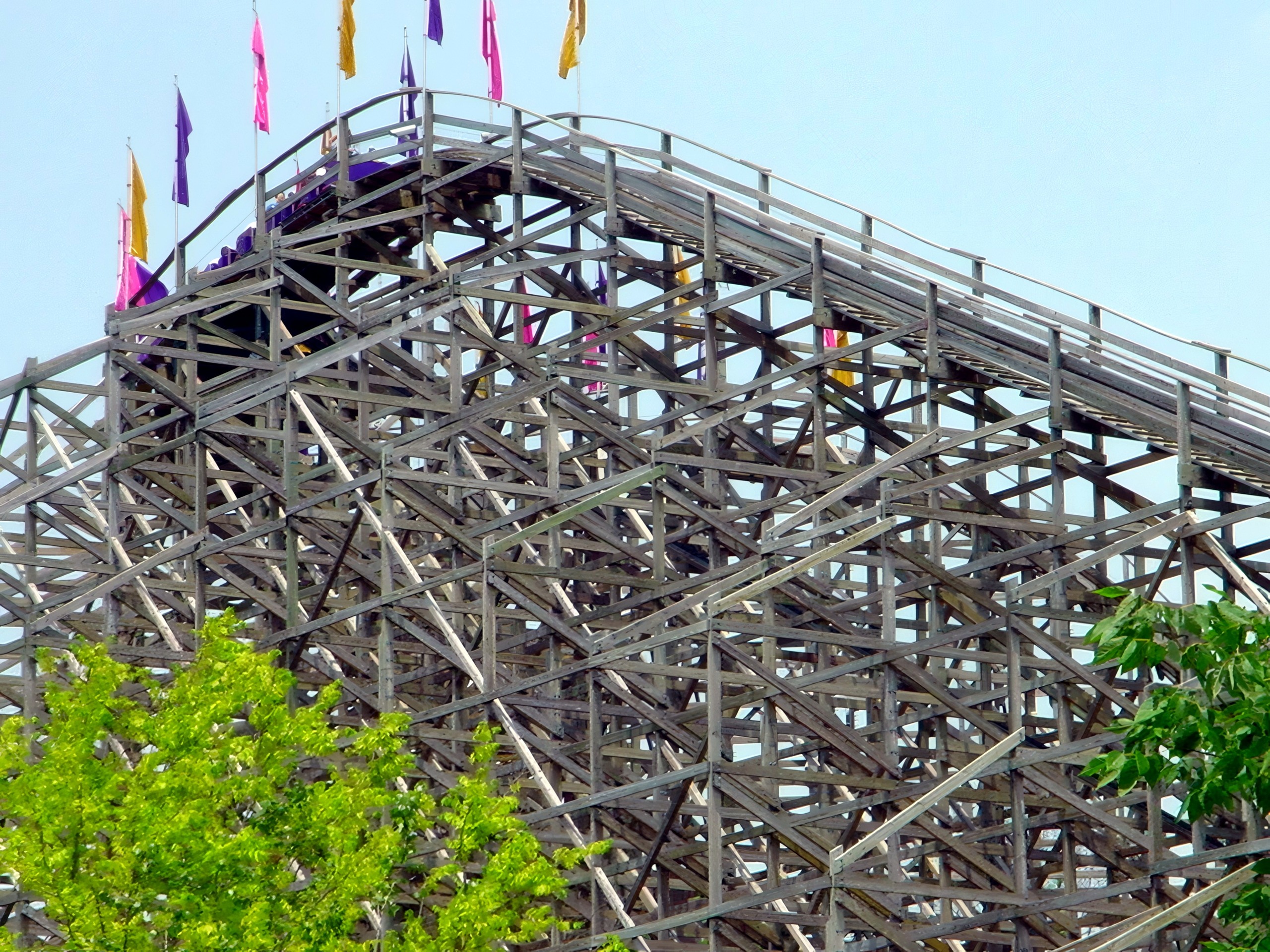 A Legend train heading into the drop past the flags, July 2002